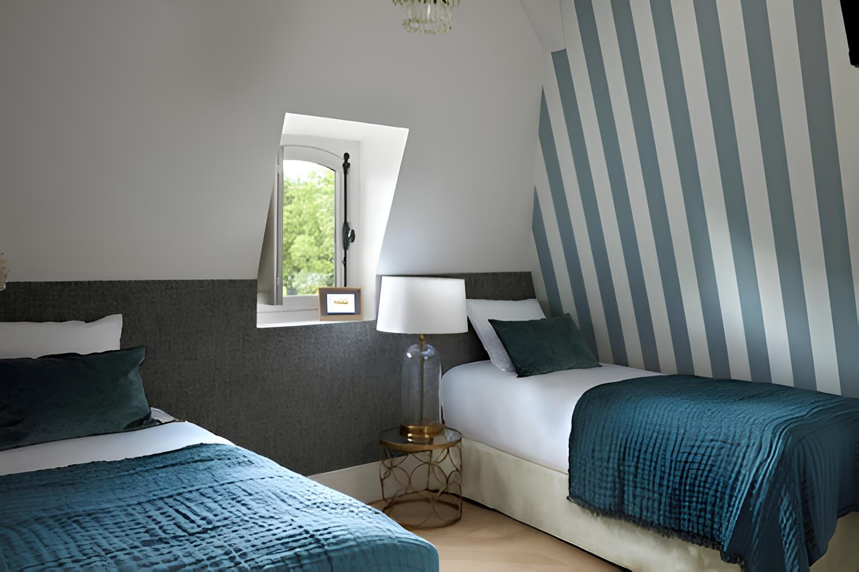 Quadruple Deluxe Room - Photo 2