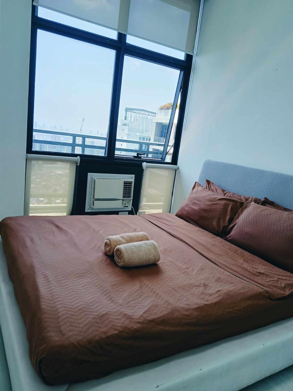 One-Bedroom Apartment with Balcony and City View