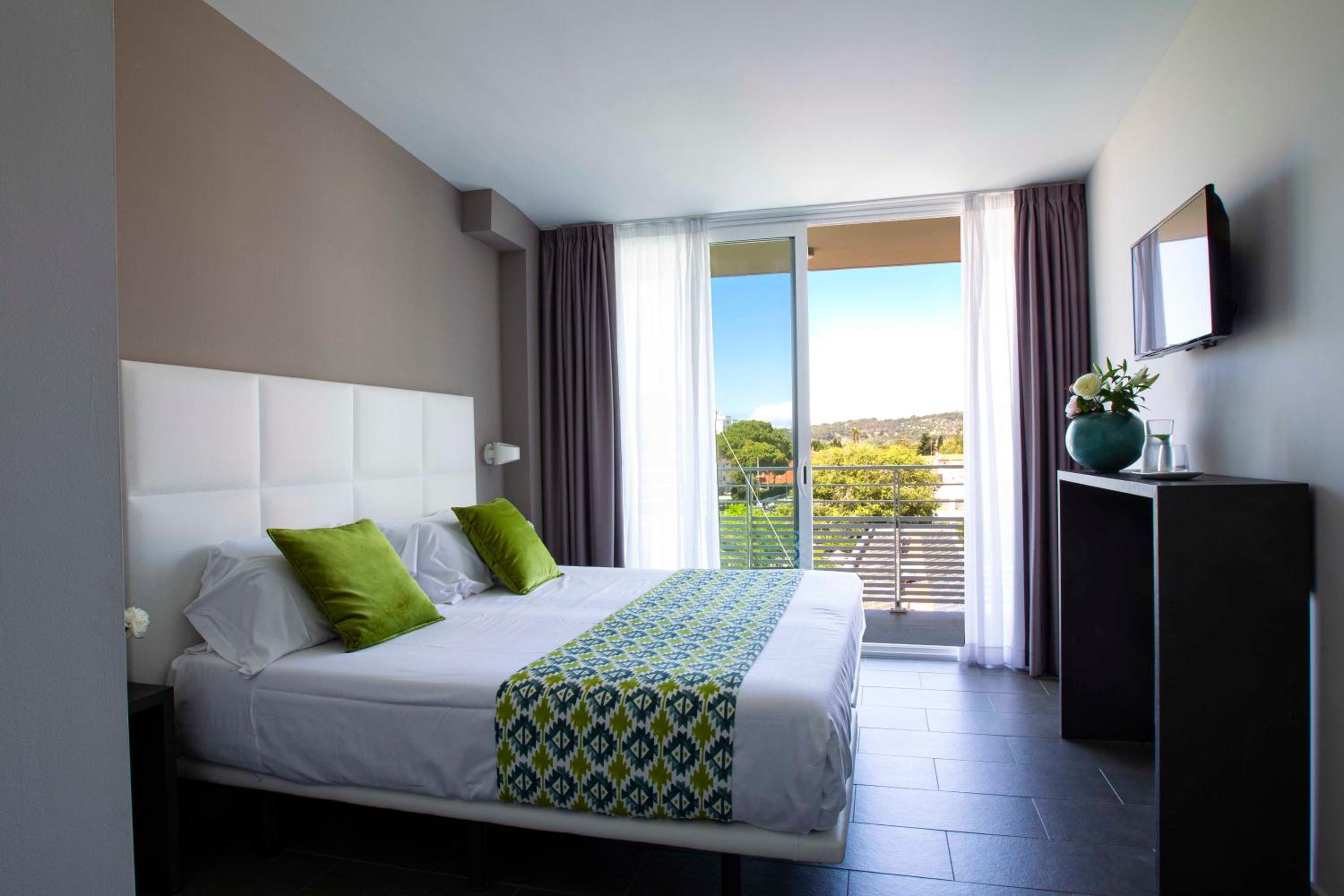 Habitación Doble Estándar o con Dos Camas Individuales.