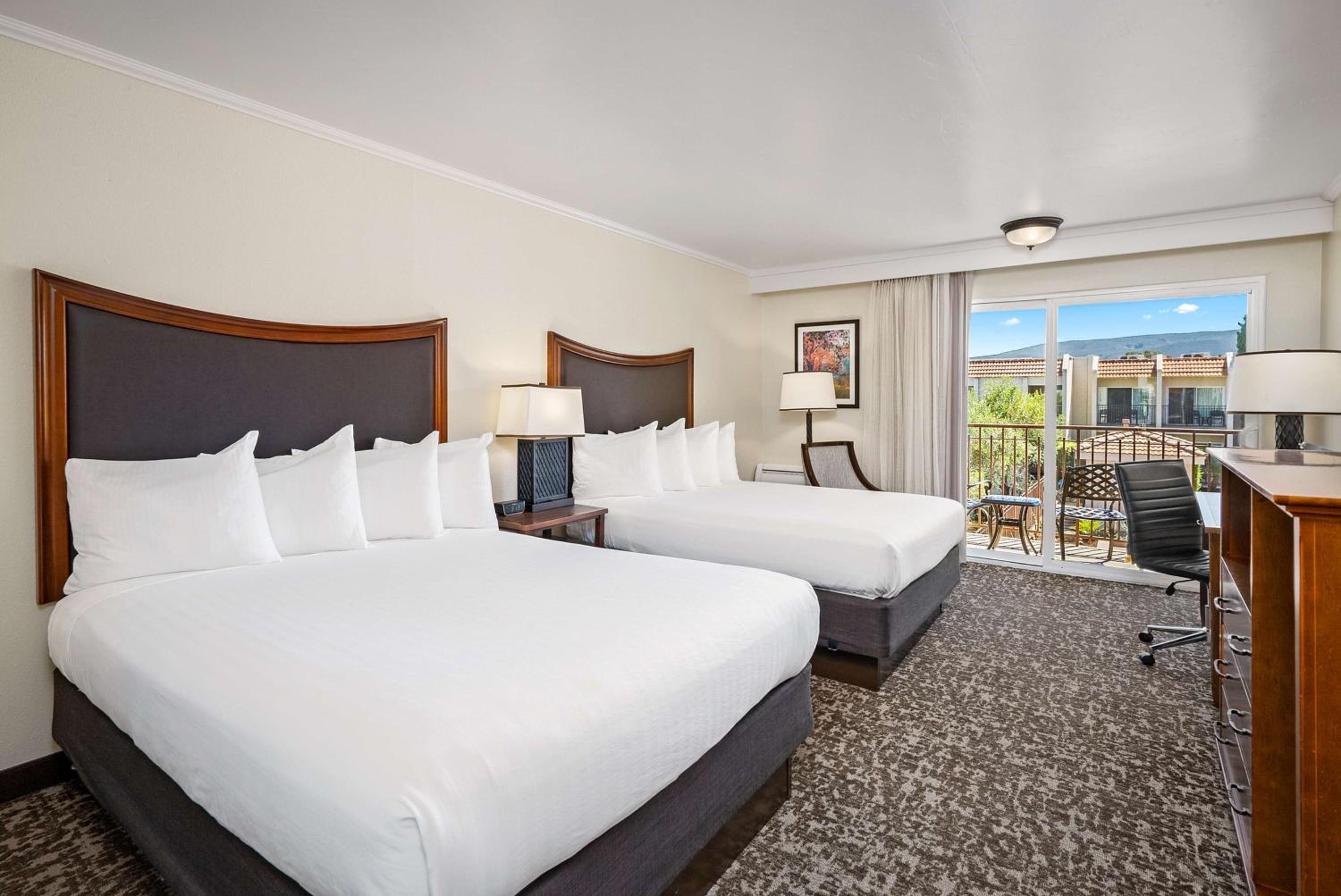 Queen Room with Two Queen Beds with Balcony & Pool View photo 1