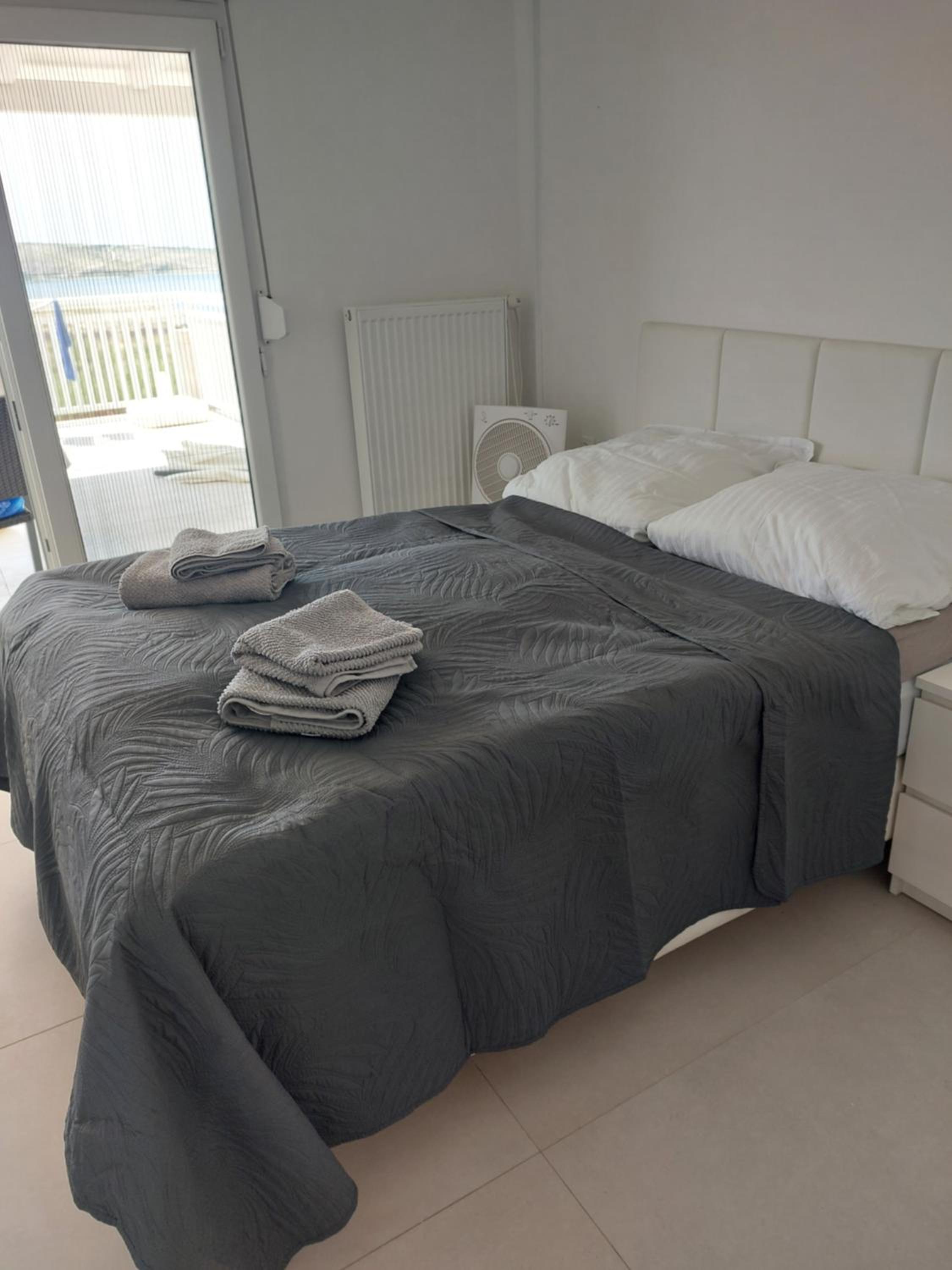 Two-Bedroom Apartment with Balcony and Terrace