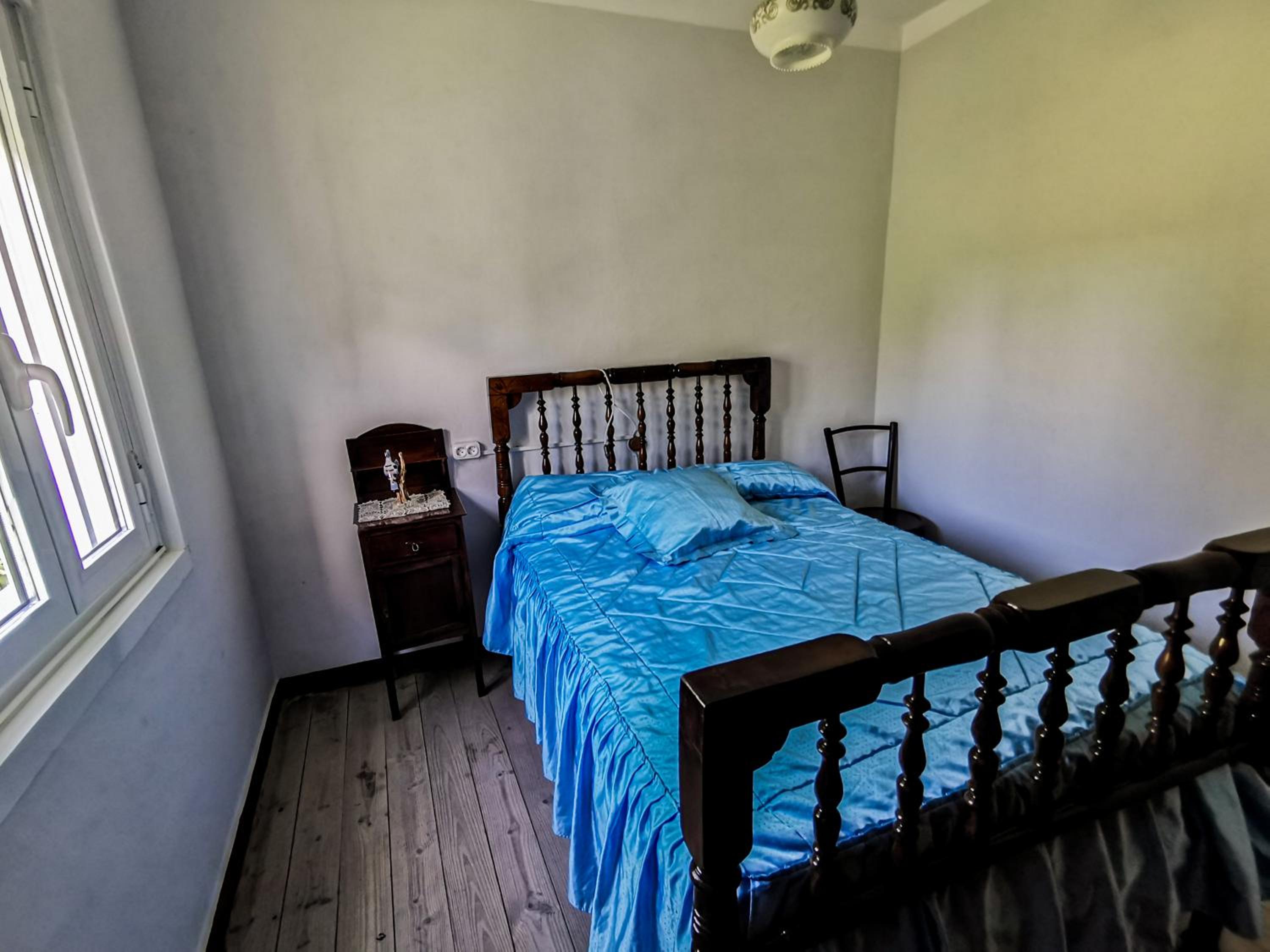 Casa de cuatro habitaciones