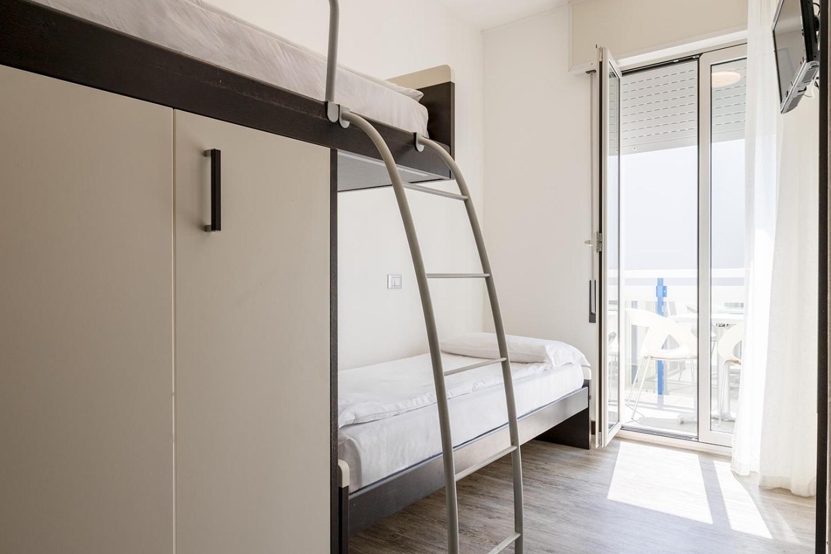 Quadruple Room with Balcony photo 2