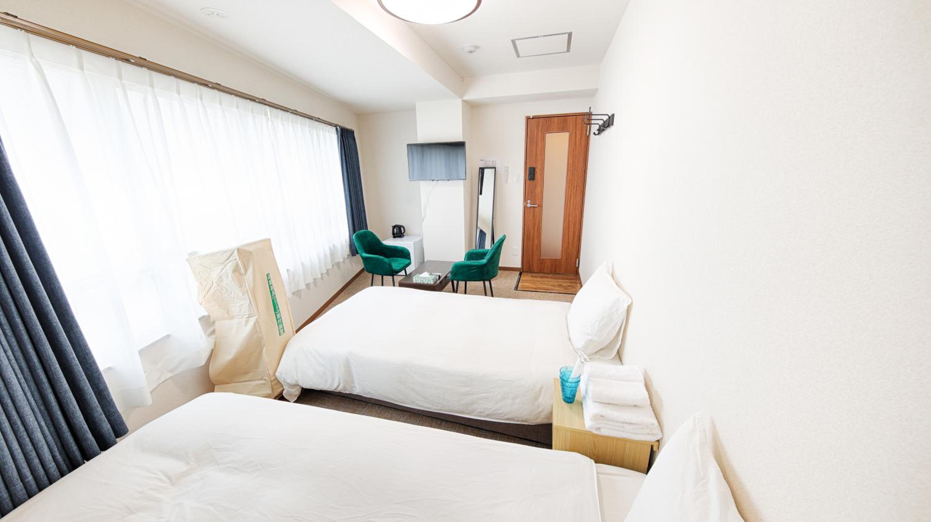 Twin Room with Shared Bathroom