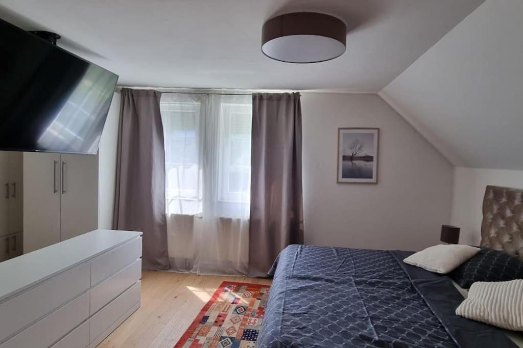 Three-Bedroom House photo 1