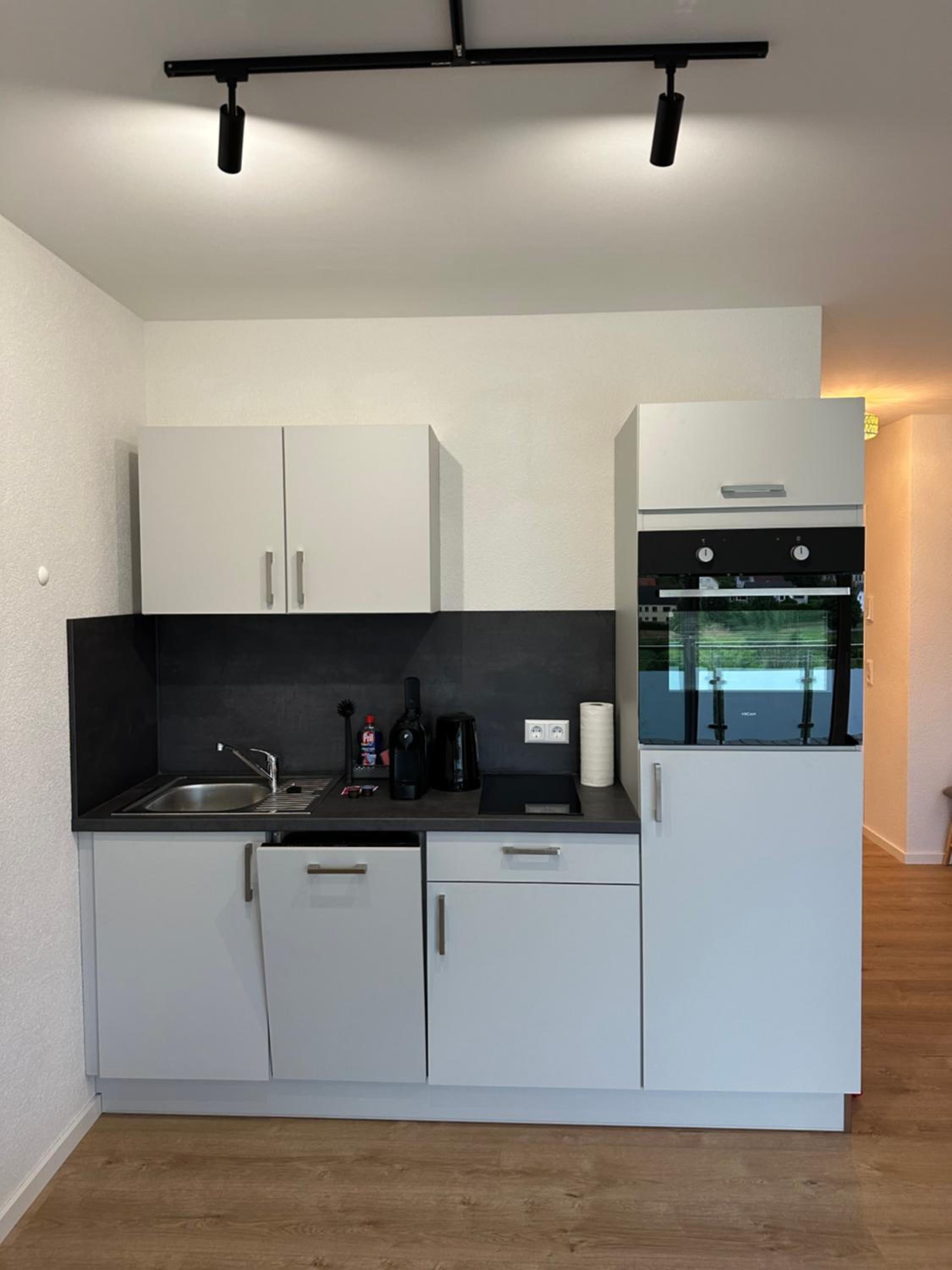 One-Bedroom Apartment with Balcony and City View photo 2