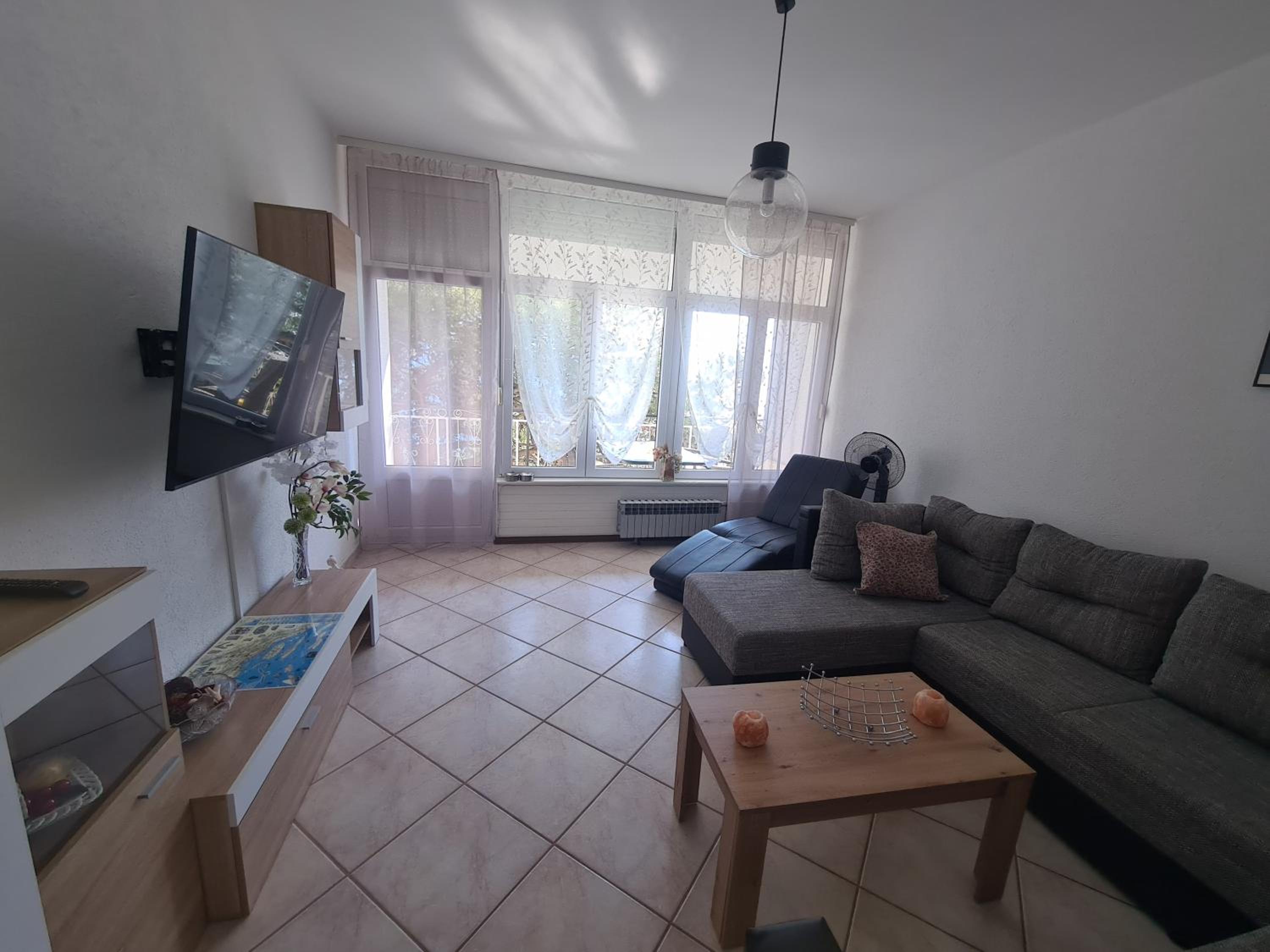 Three-Bedroom Apartment photo 1