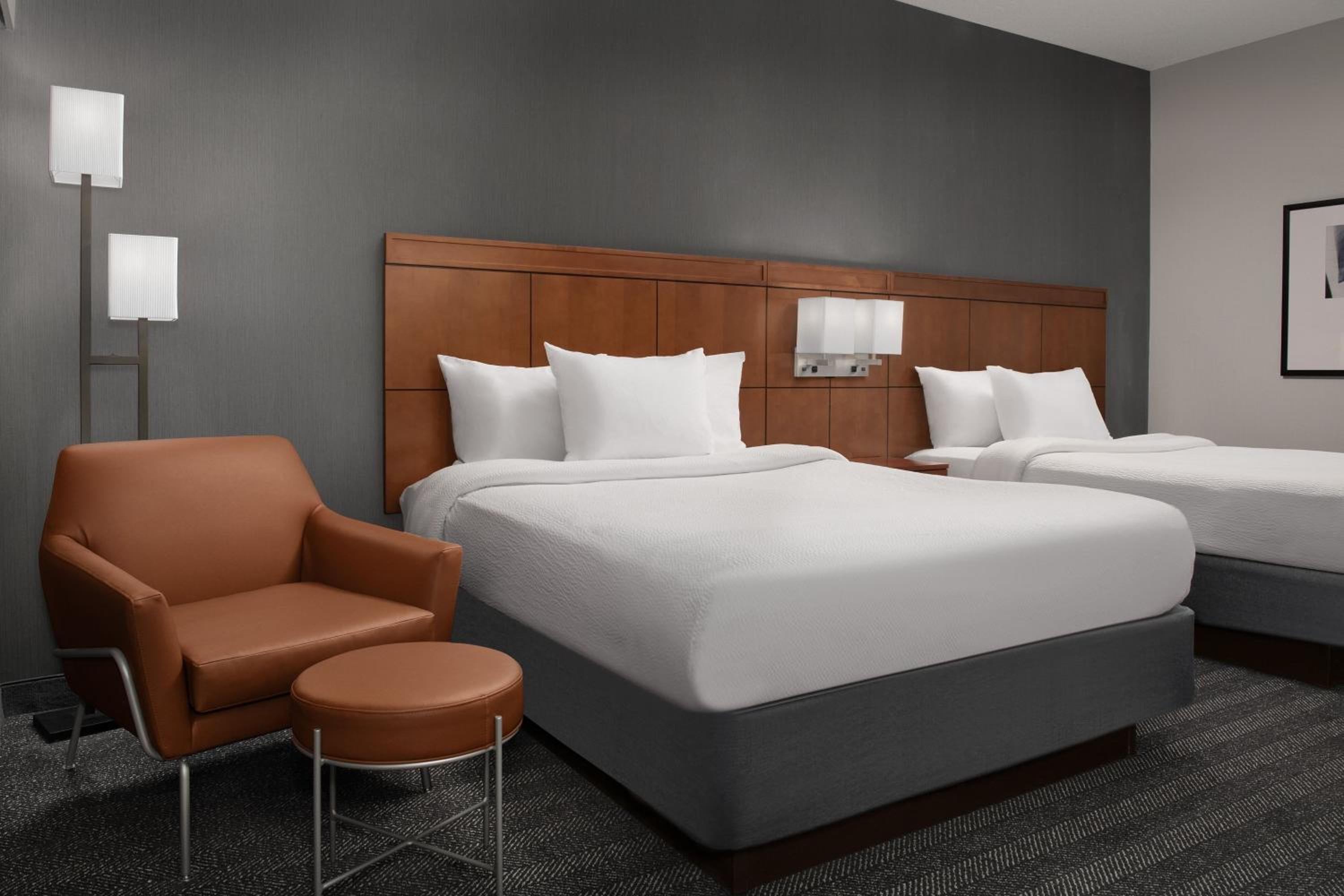 Queen Room with Two Queen Beds - Hearing Accessible photo 1