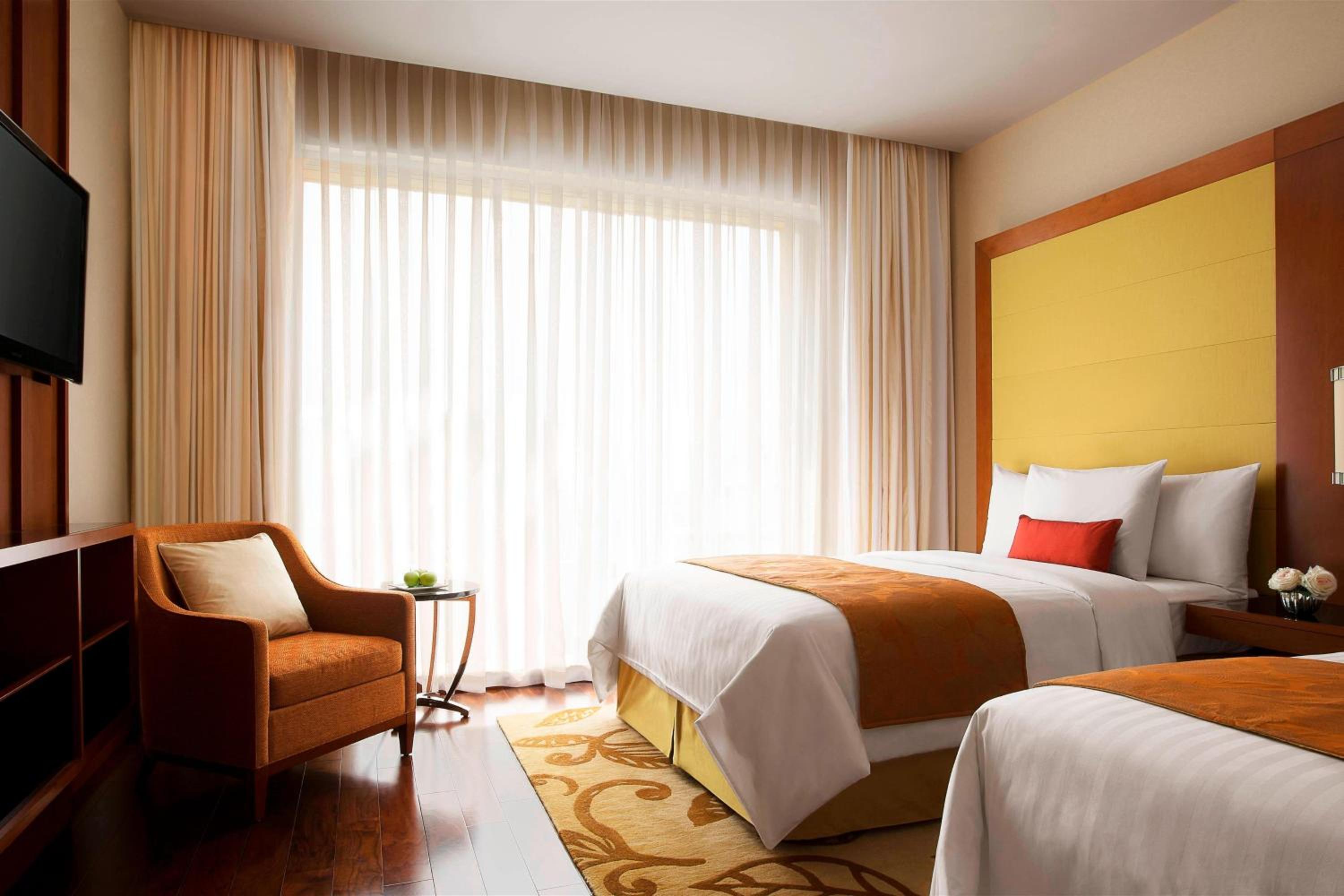Executive Twin Room with complimentary two-way airport transfers, Executive Lounge Access. INR 500 hotel credit per room per night, Access to Taberna Bar with unlimited beverages for two hours
