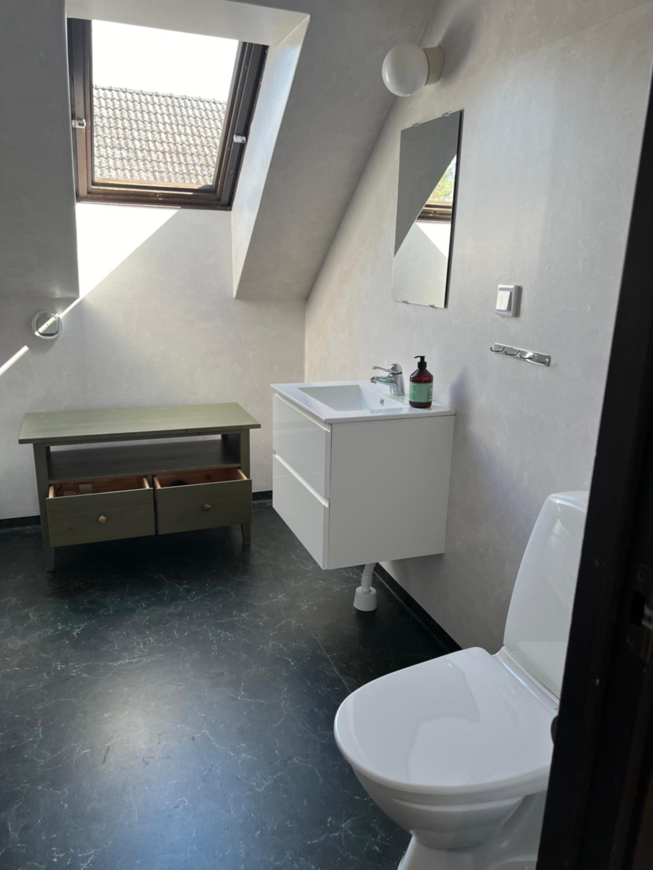 Three-Bedroom House - Photo 40