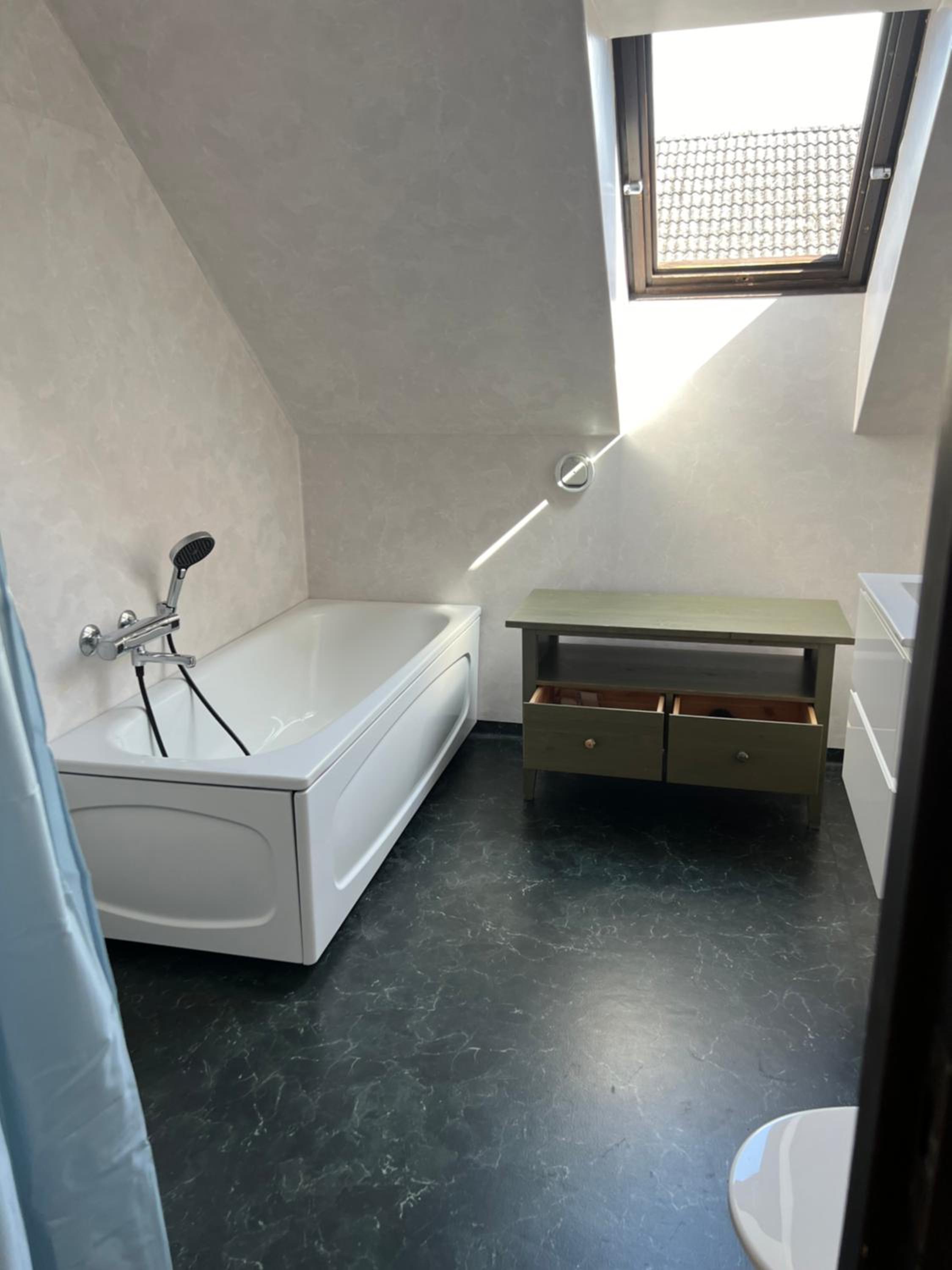 Three-Bedroom House - Photo 41