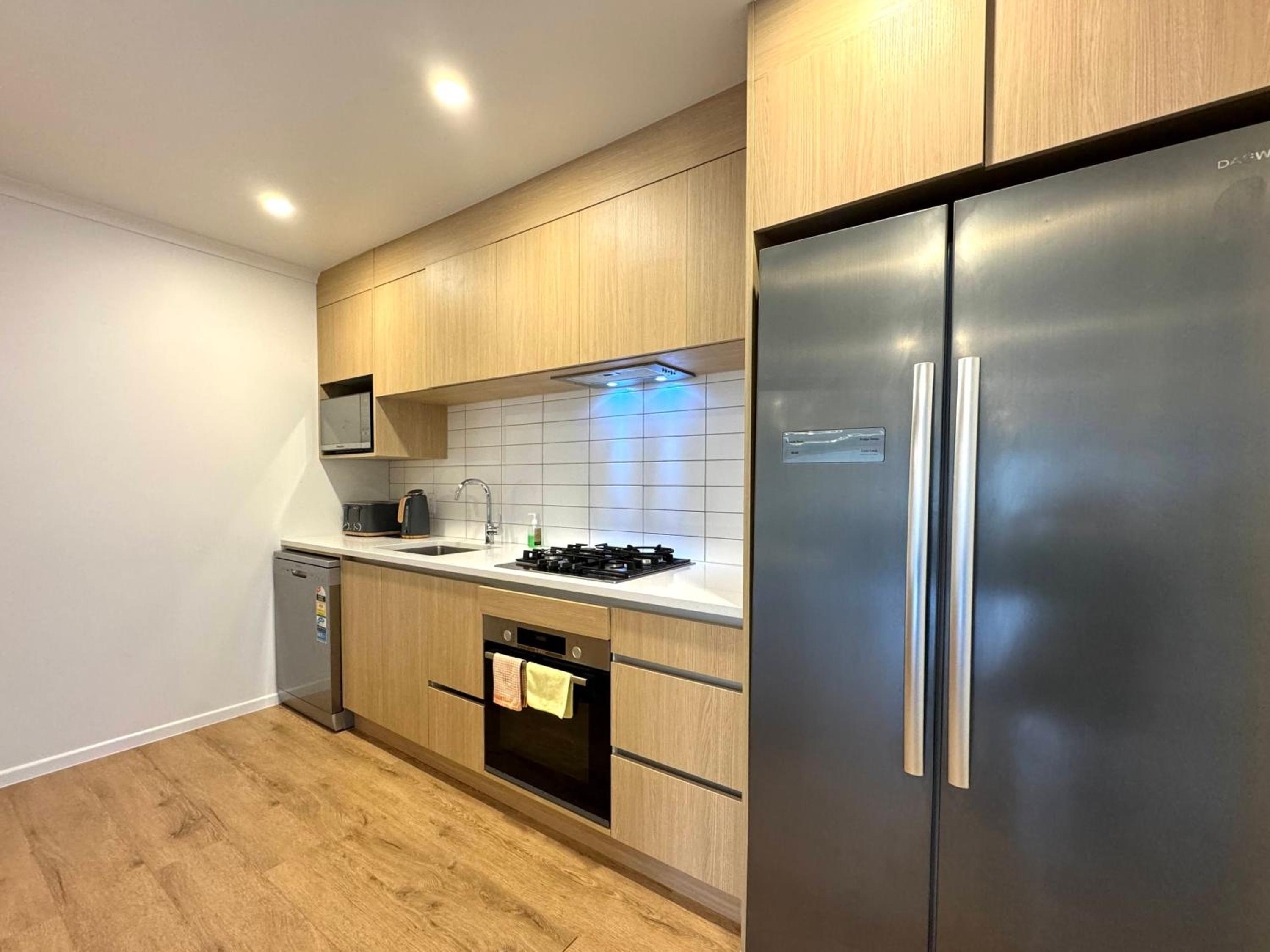 Three-Bedroom Townhouse - Photo 2