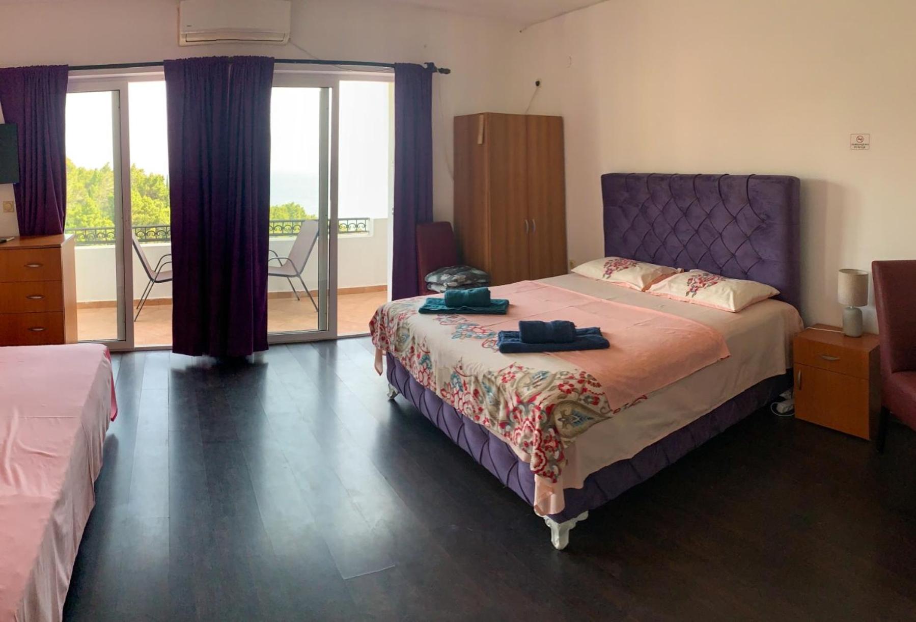 Quadruple Room with Balcony and Sea View