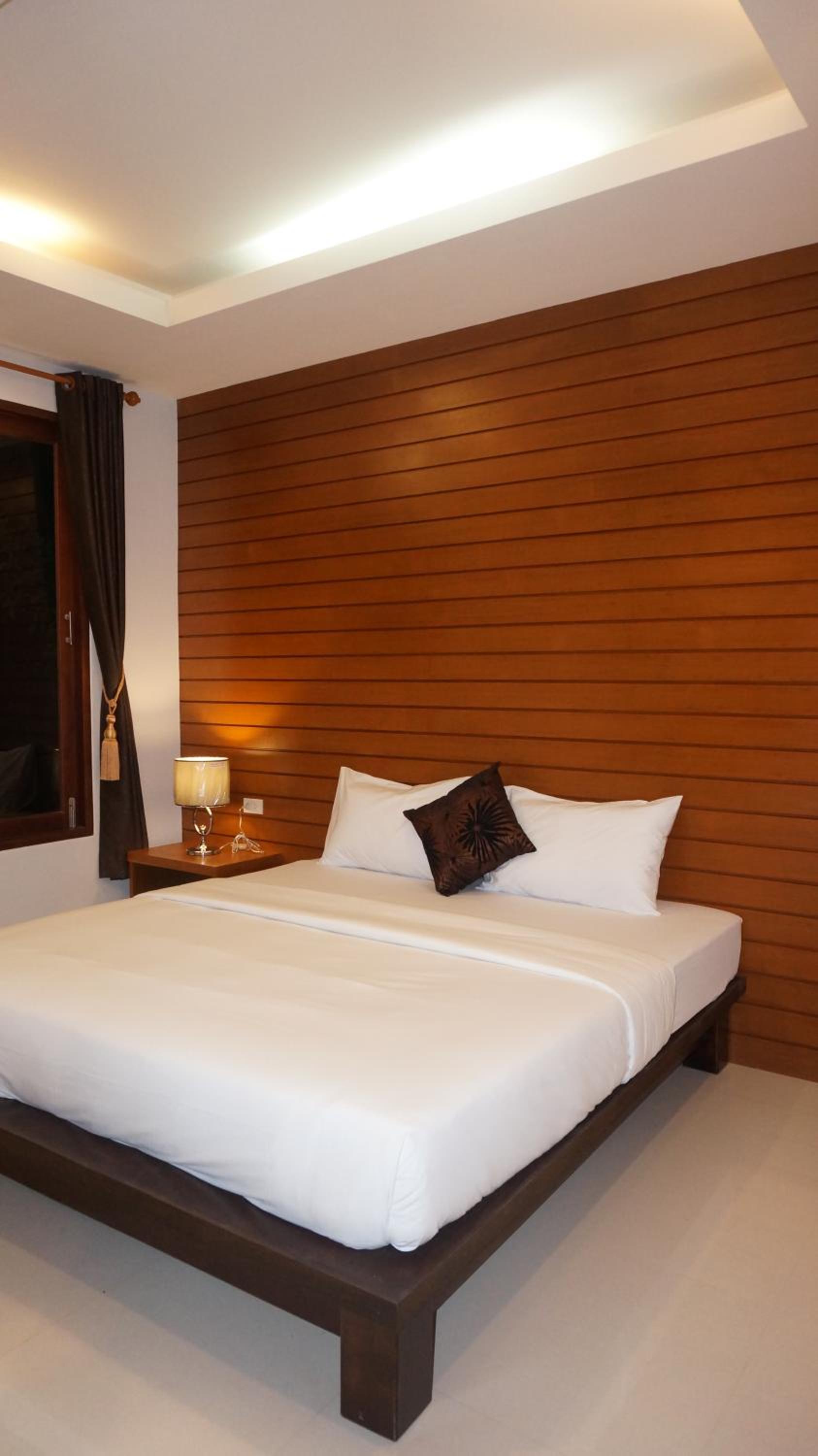Deluxe Family Suite - Photo 15