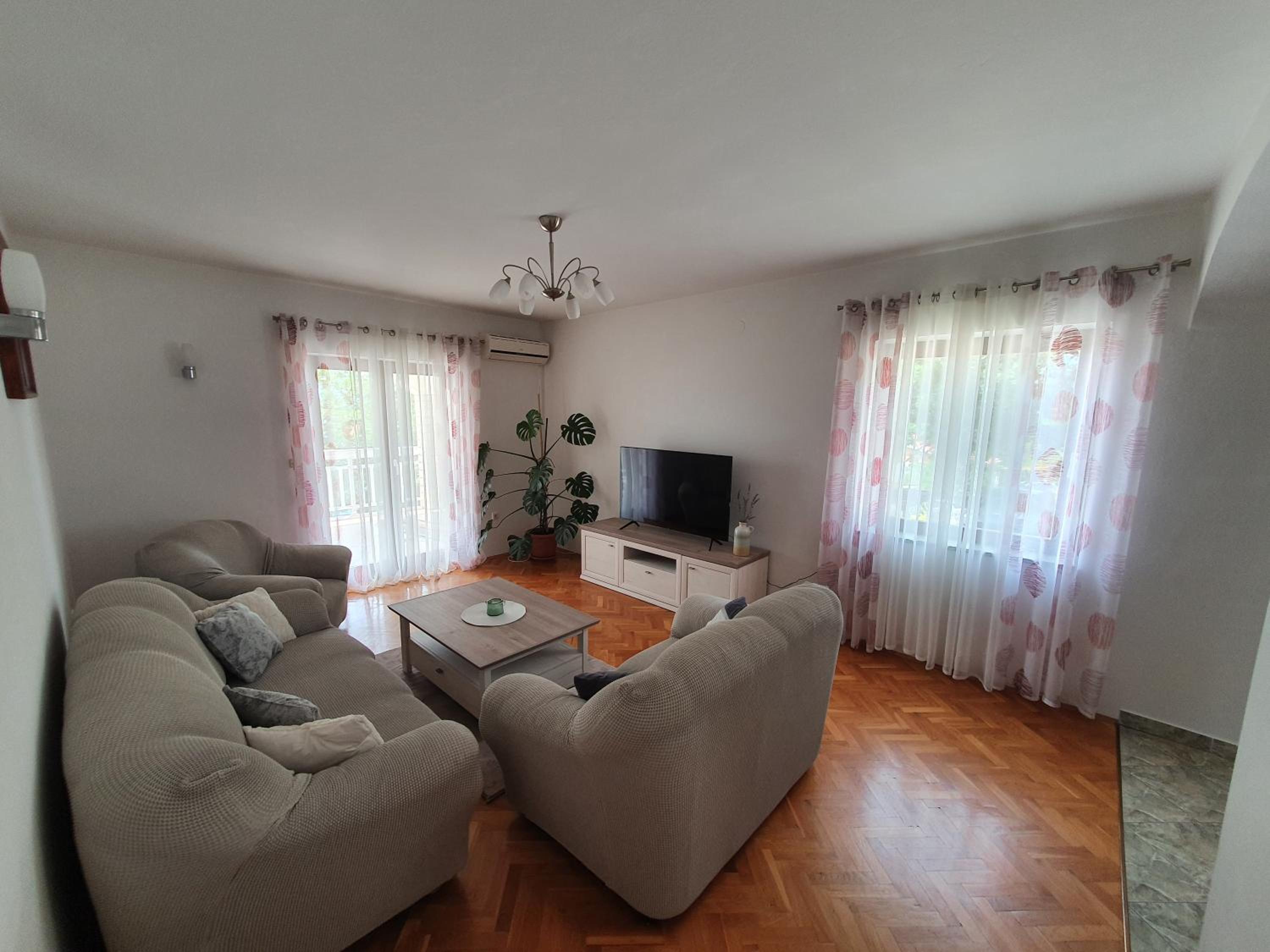 Three-Bedroom Apartment photo 1