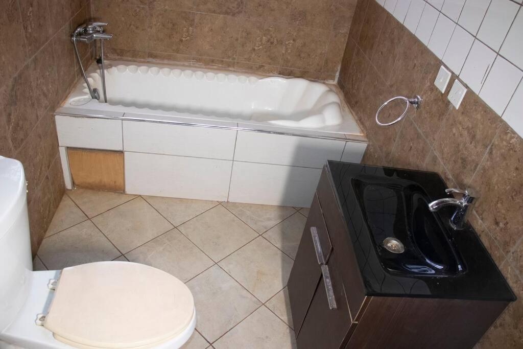 Three-Bedroom Apartment photo 2