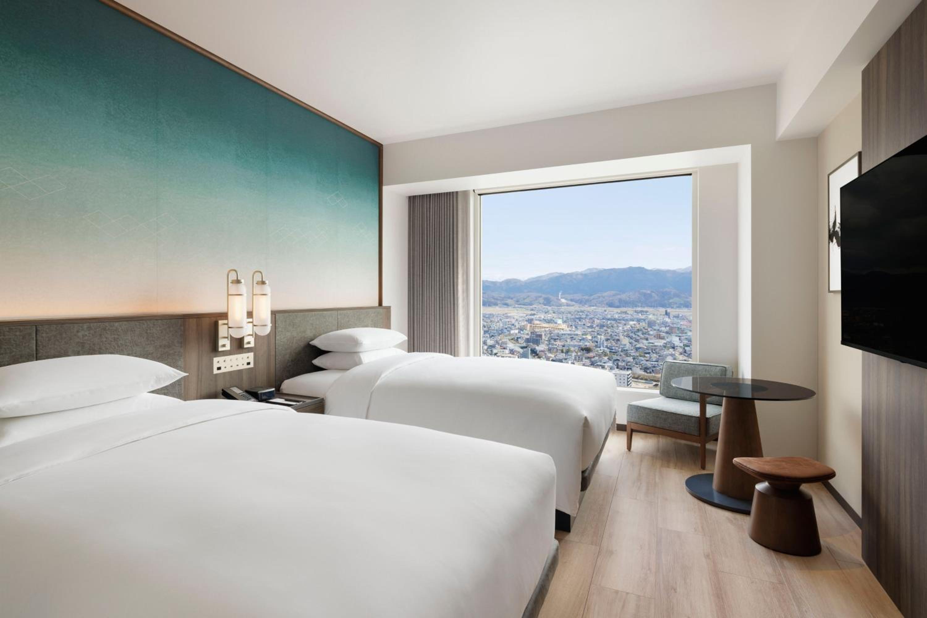 Deluxe Double Room with Two Double Beds and Mountain View - Photo 1