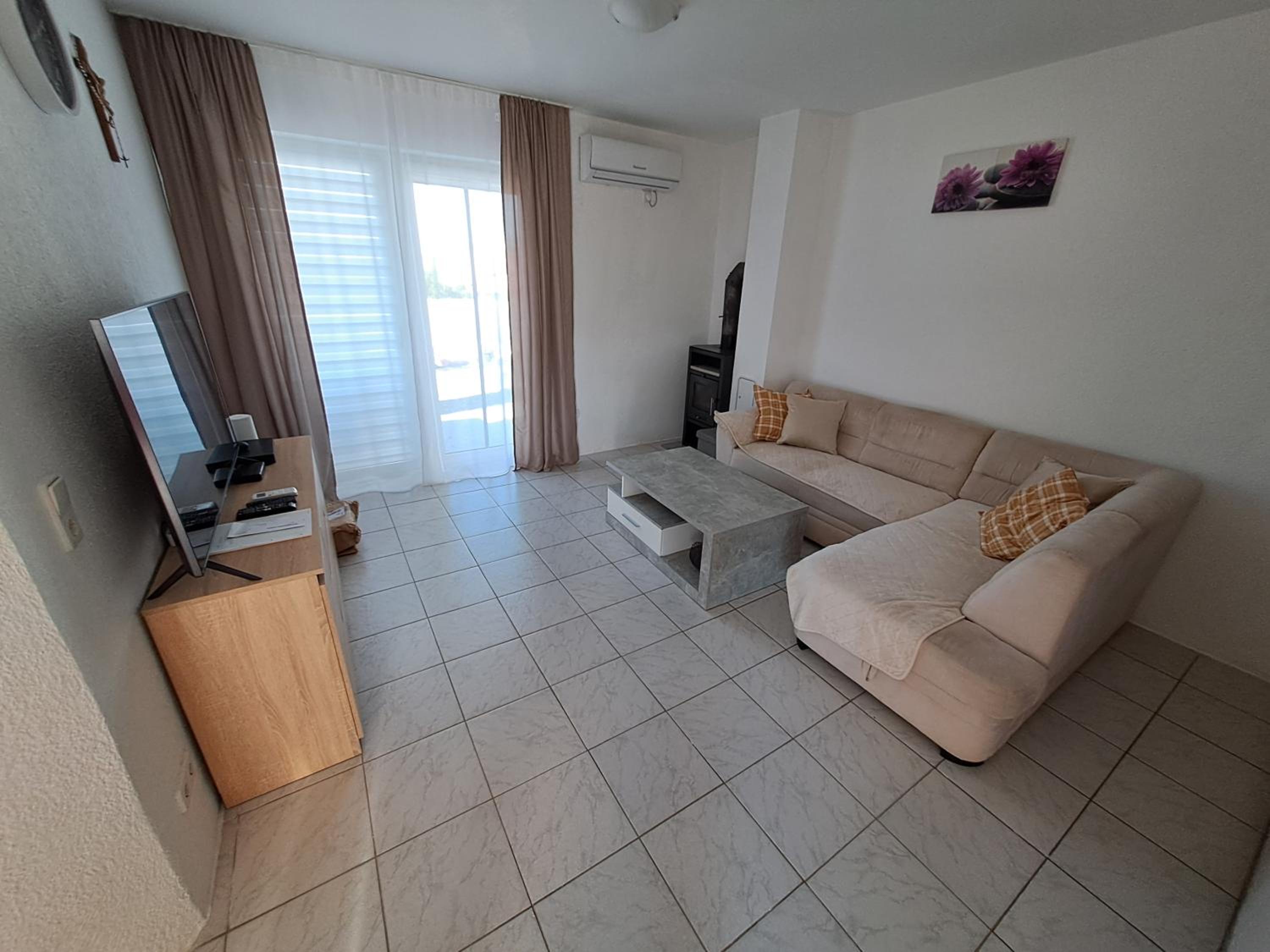 Two-Bedroom Apartment with Terrace and Sea View