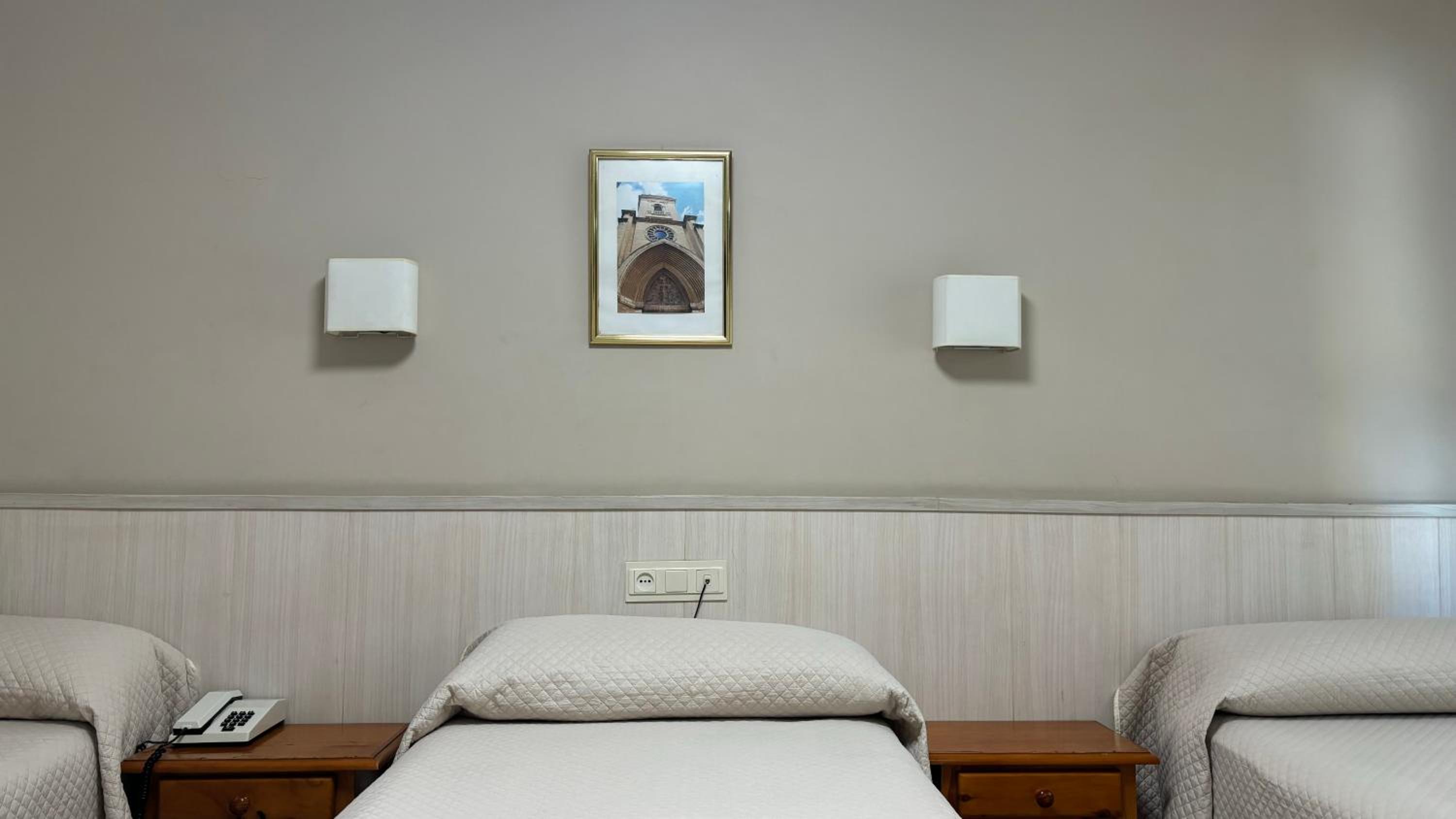 Habitación triple con baño