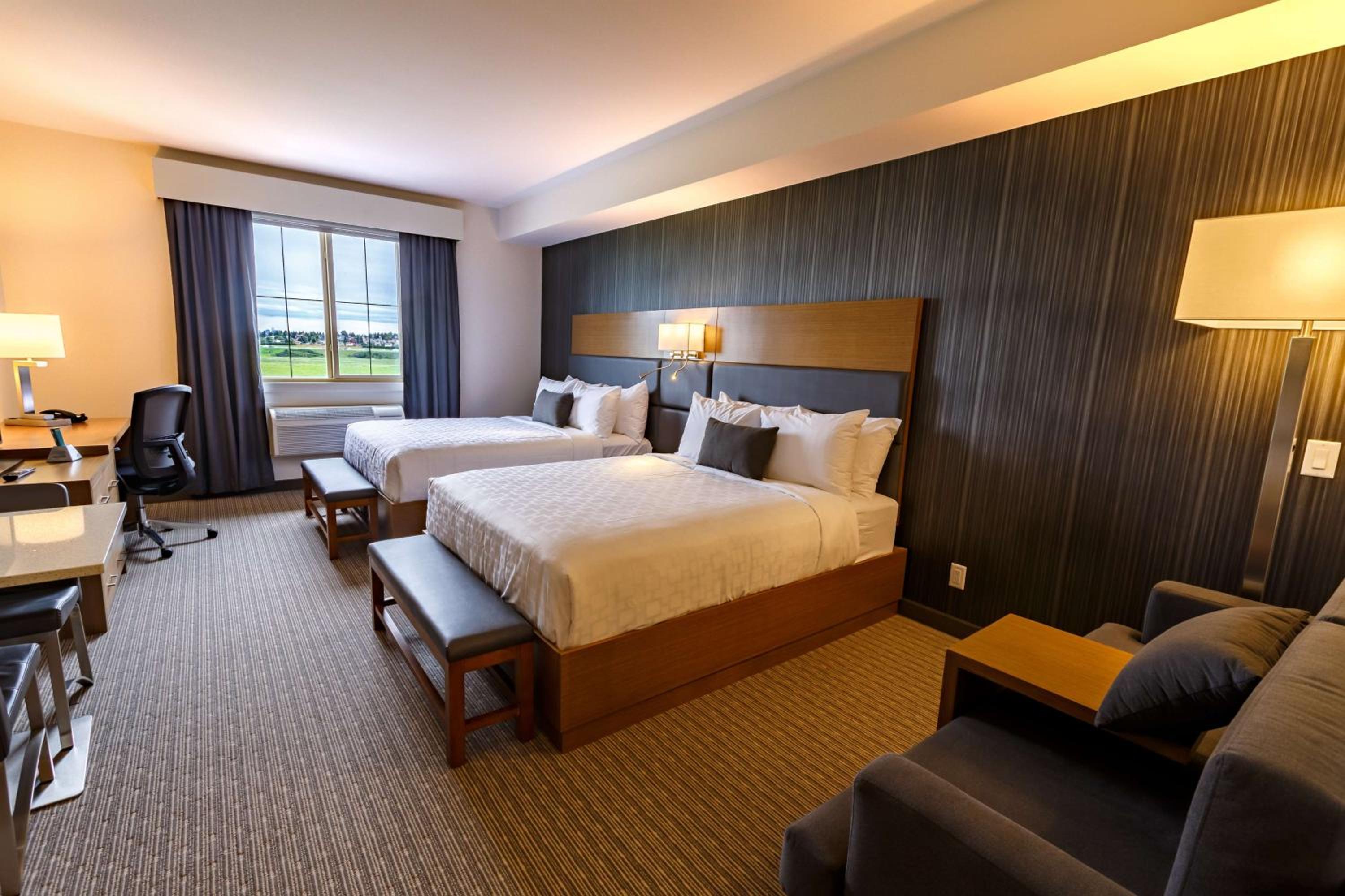 Queen Room with Two Queen Beds and Kitchenette - Non-Smoking - Photo 1