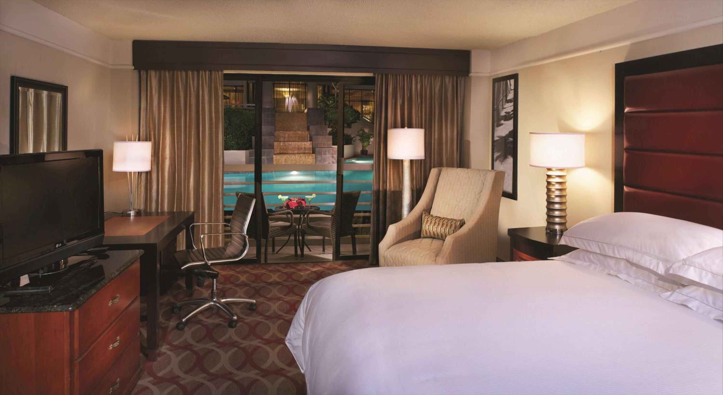 King Room with Pool View - Photo 1