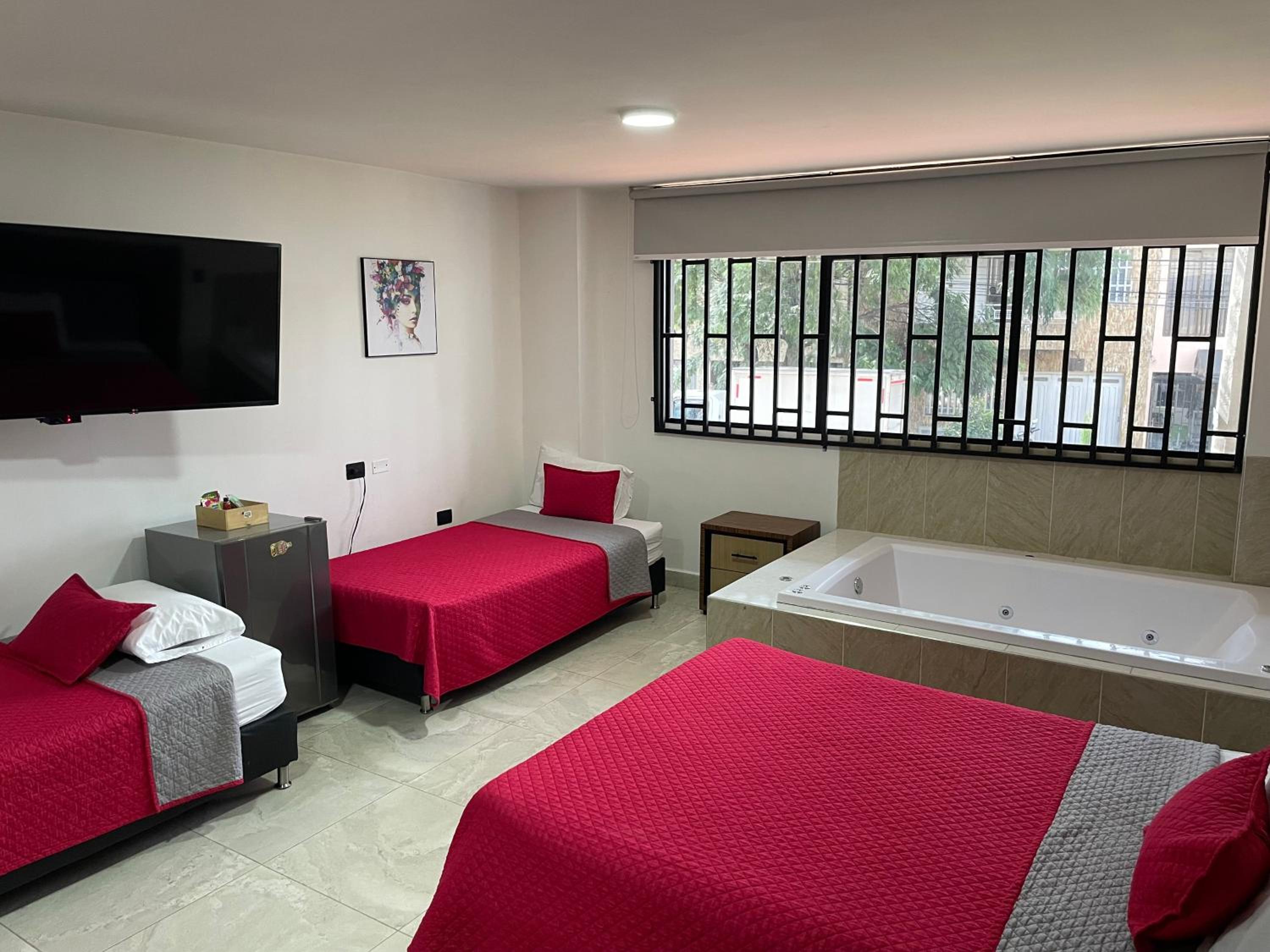 Habitacion Deluxe Cuadruple Con Bañera