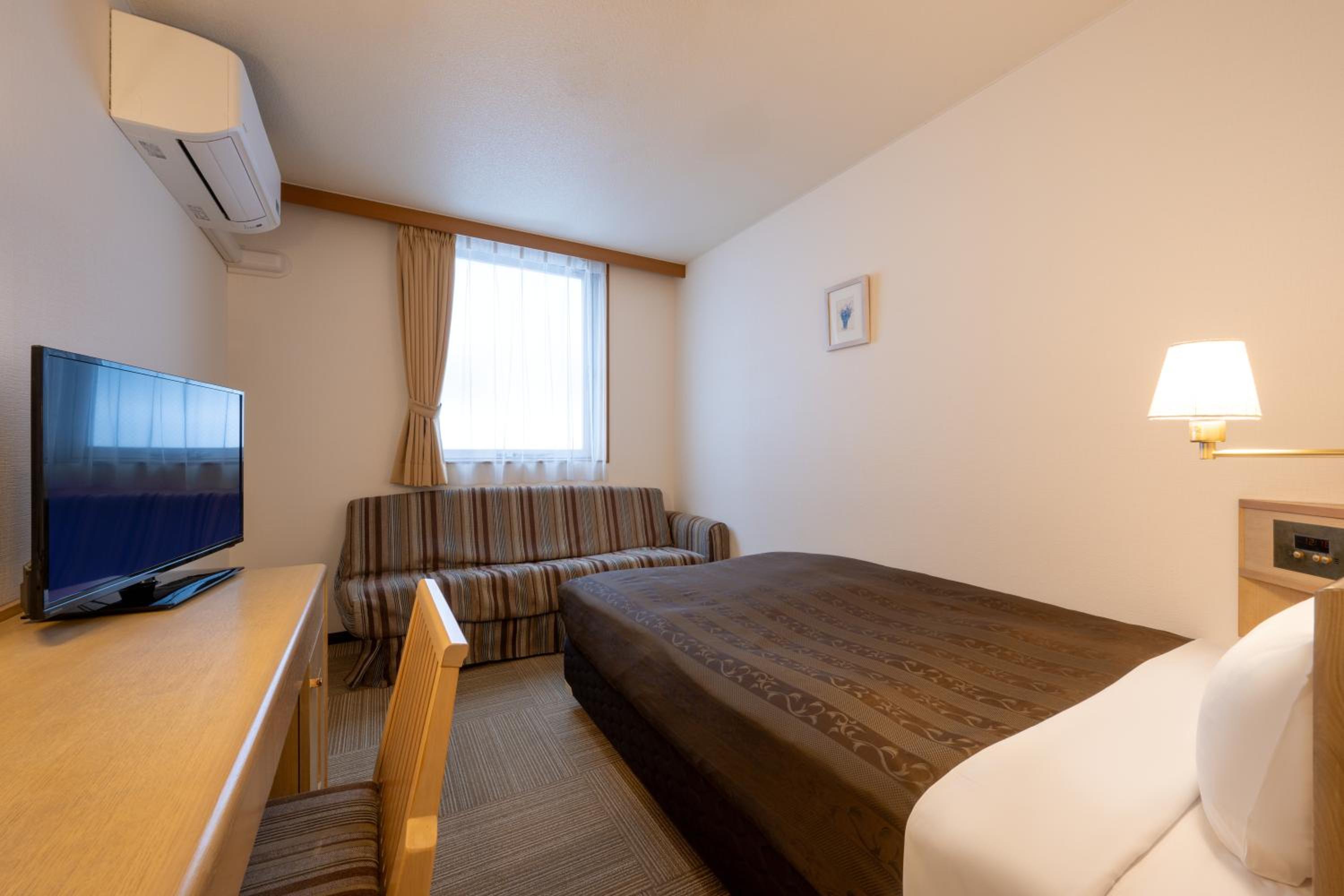 Single Room with Private Toilet - Non-Smoking - Photo 1
