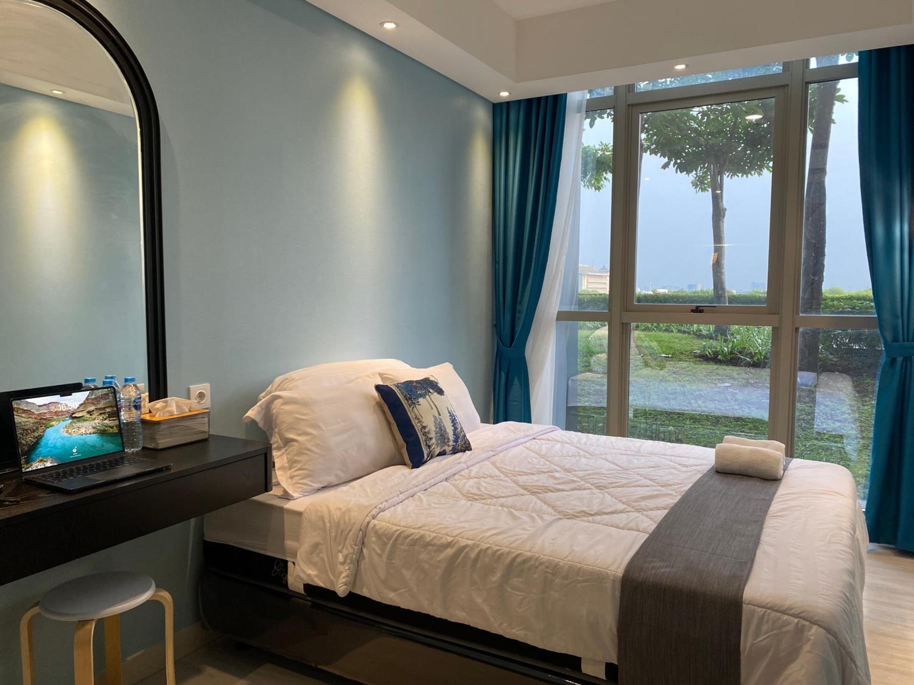 Two-Bedroom Deluxe Apartment with Garden View - Photo 1