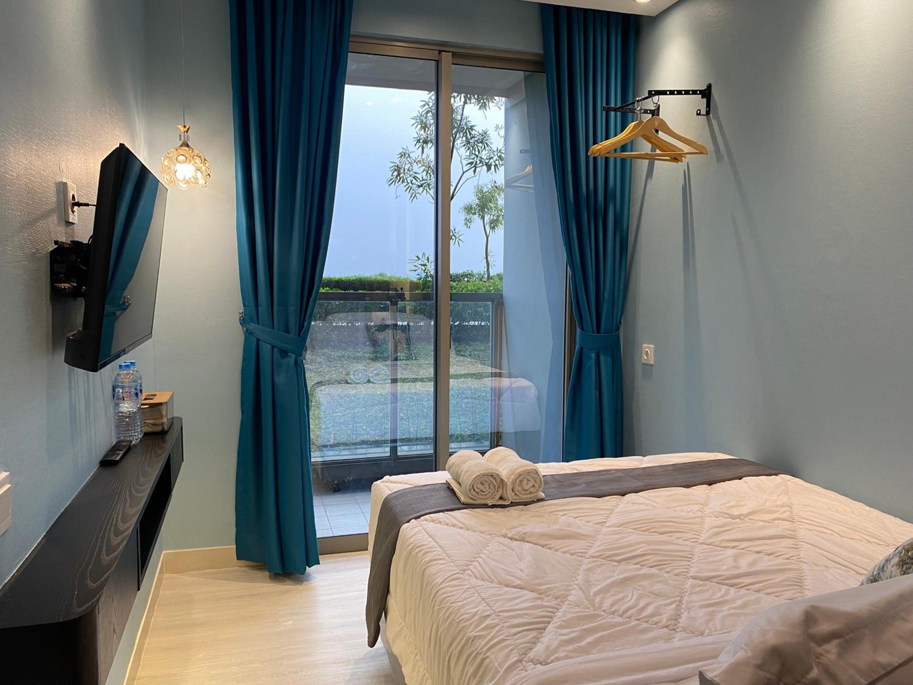 Two-Bedroom Deluxe Apartment with Garden View - Photo 3