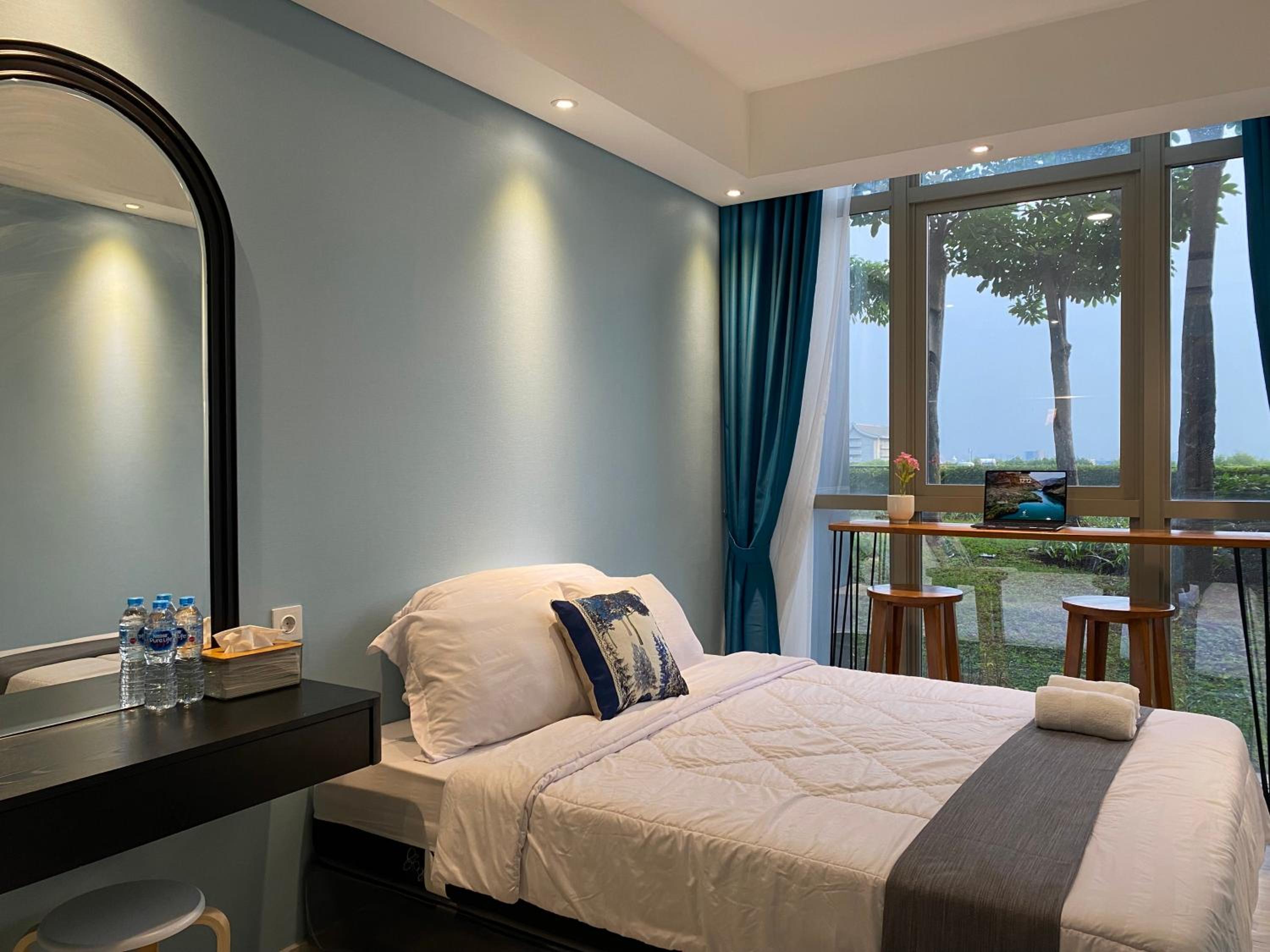 Two-Bedroom Deluxe Apartment with Garden View - Photo 25