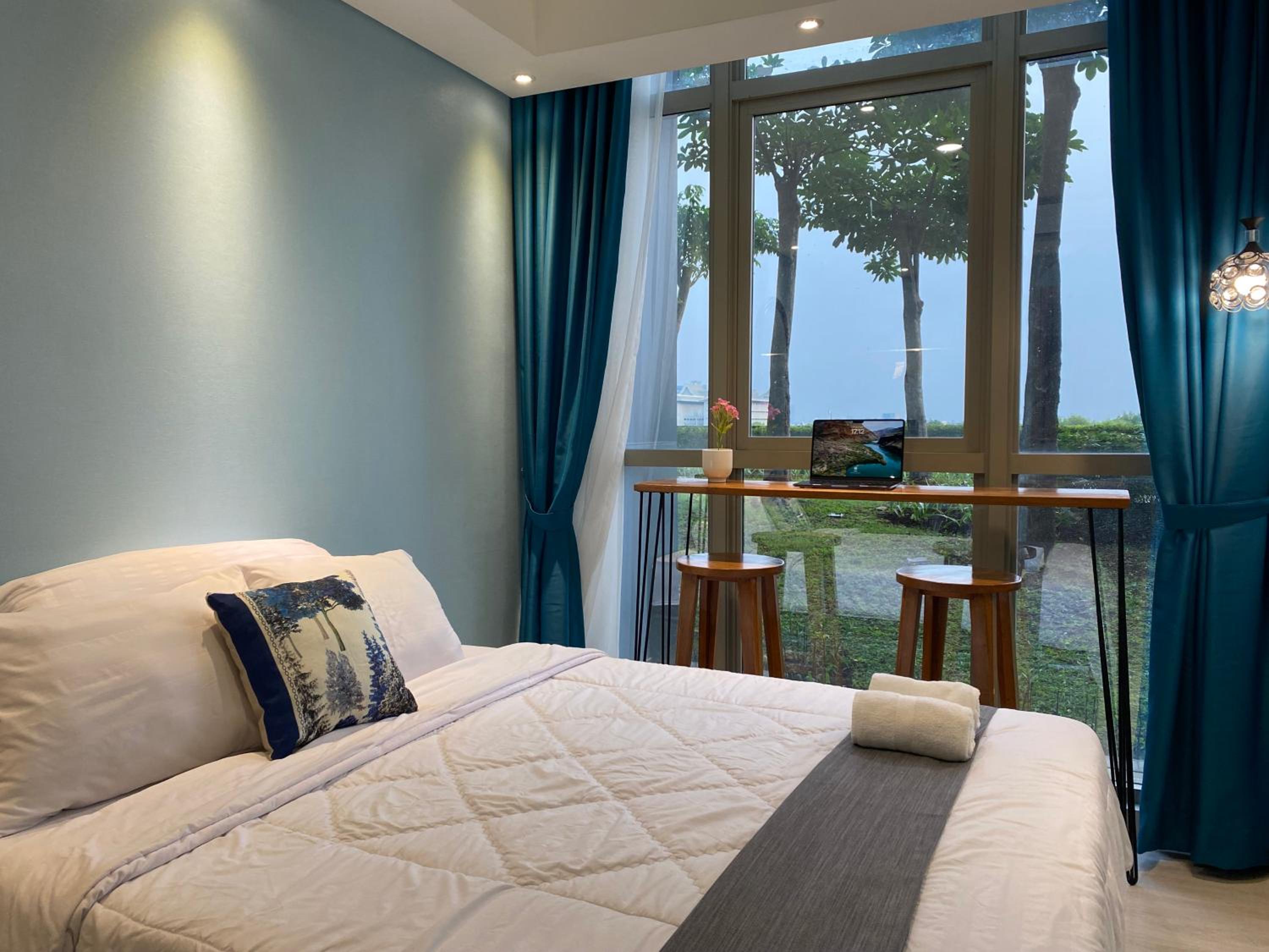 Two-Bedroom Deluxe Apartment with Garden View - Photo 24