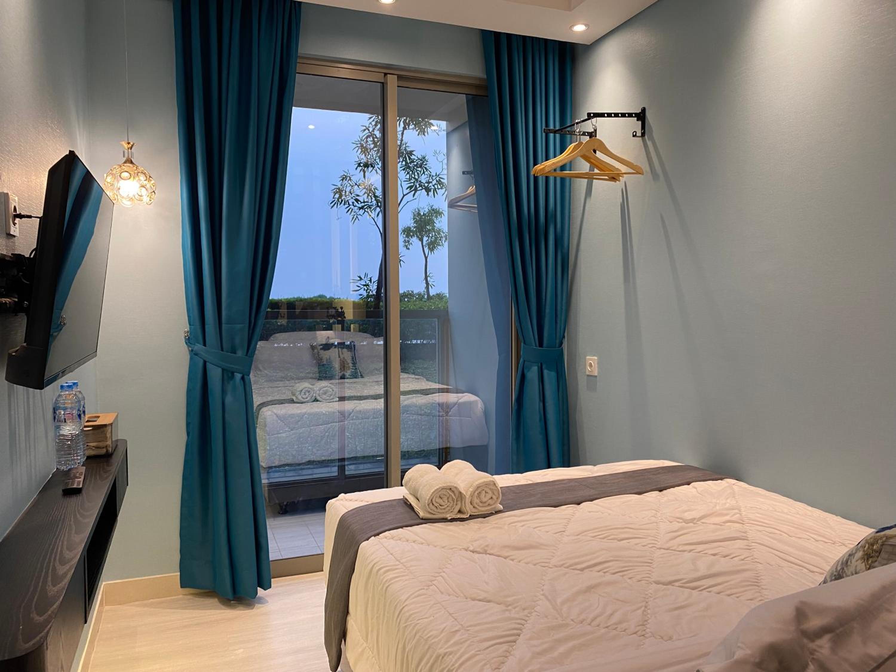 Two-Bedroom Deluxe Apartment with Garden View - Photo 9