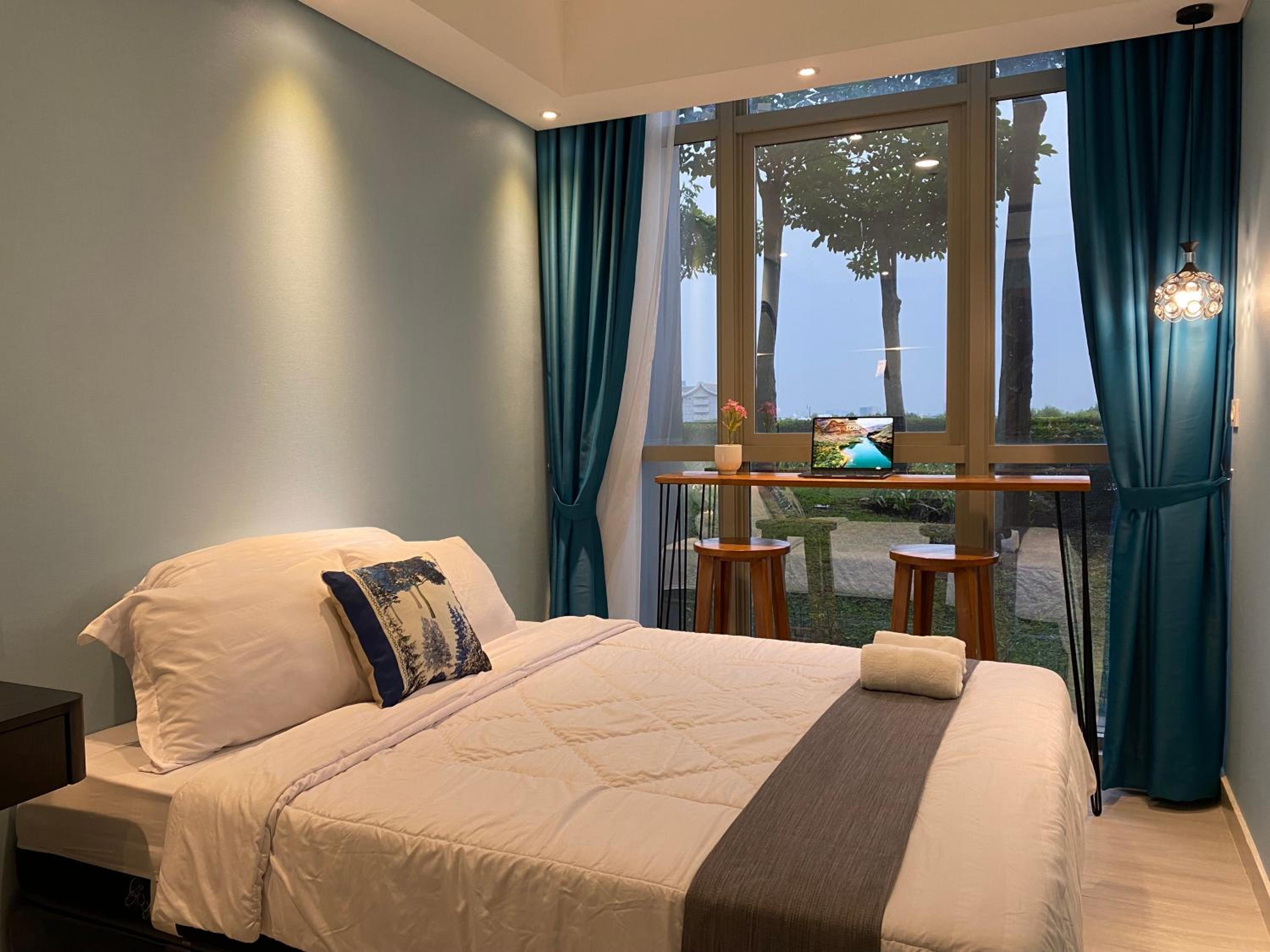 Two-Bedroom Deluxe Apartment with Garden View - Photo 21