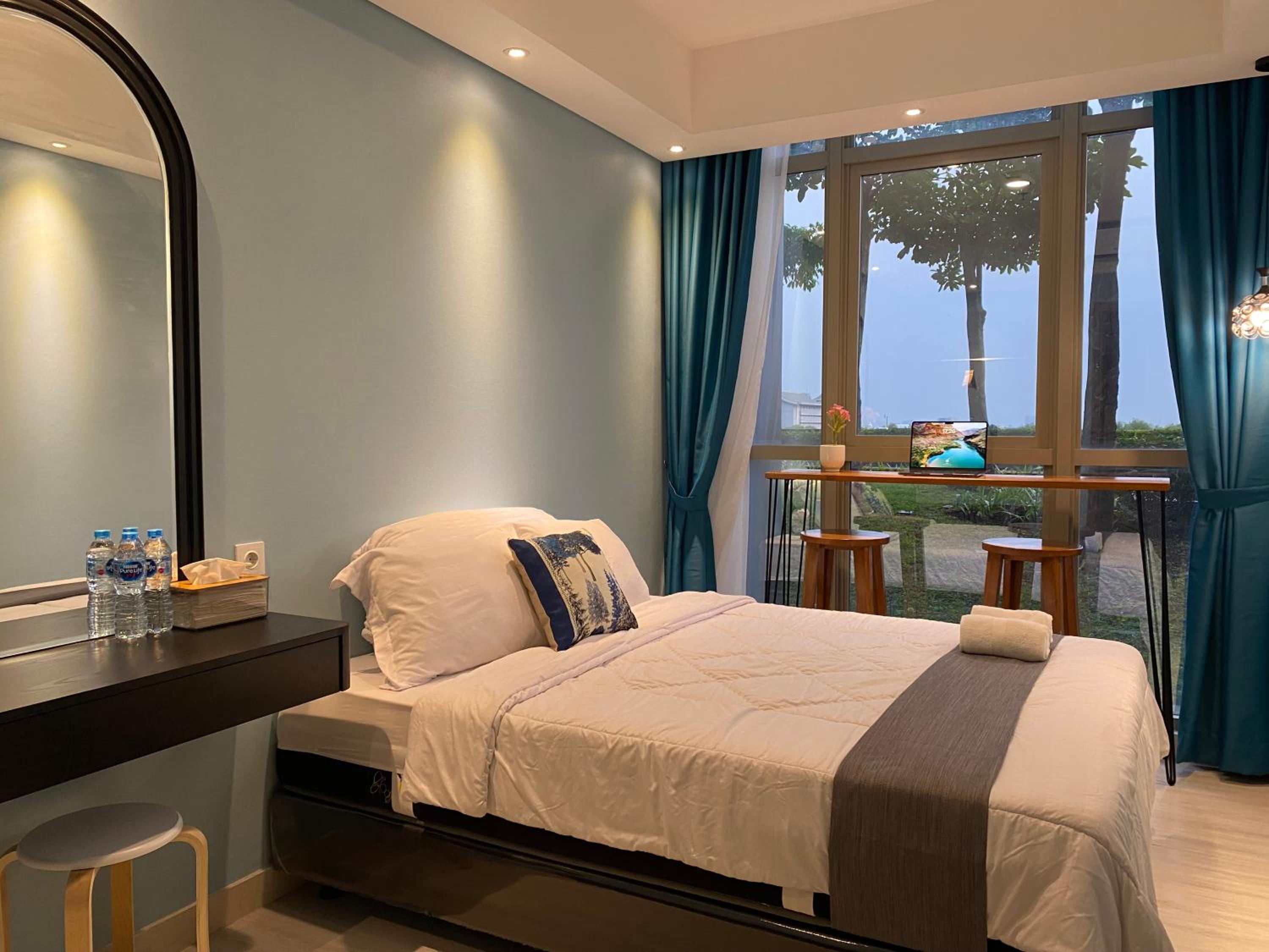 Two-Bedroom Deluxe Apartment with Garden View - Photo 20