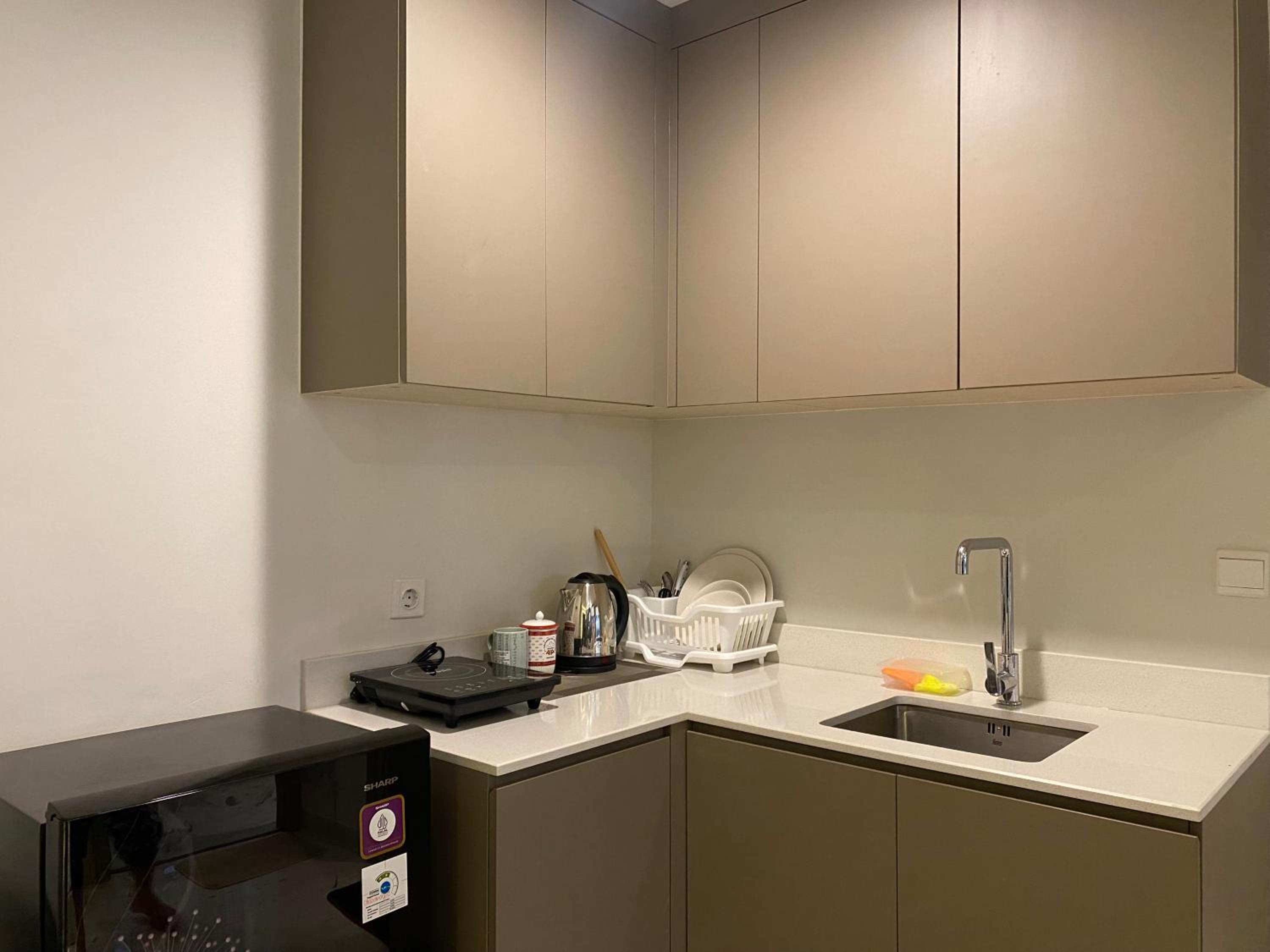 Two-Bedroom Deluxe Apartment with Garden View - Photo 18