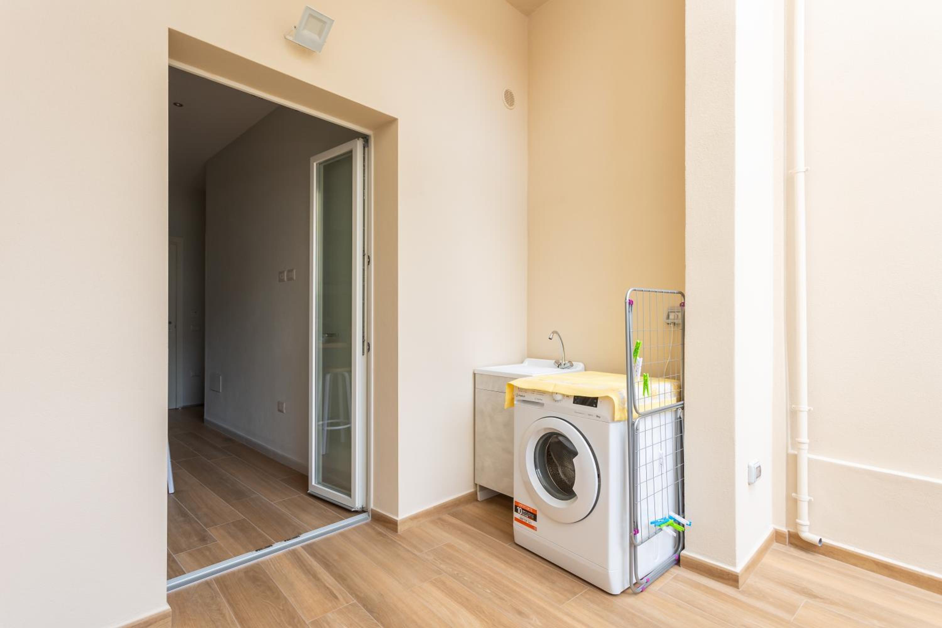 Two-Bedroom Apartment with Balcony and Terrace - Photo 15