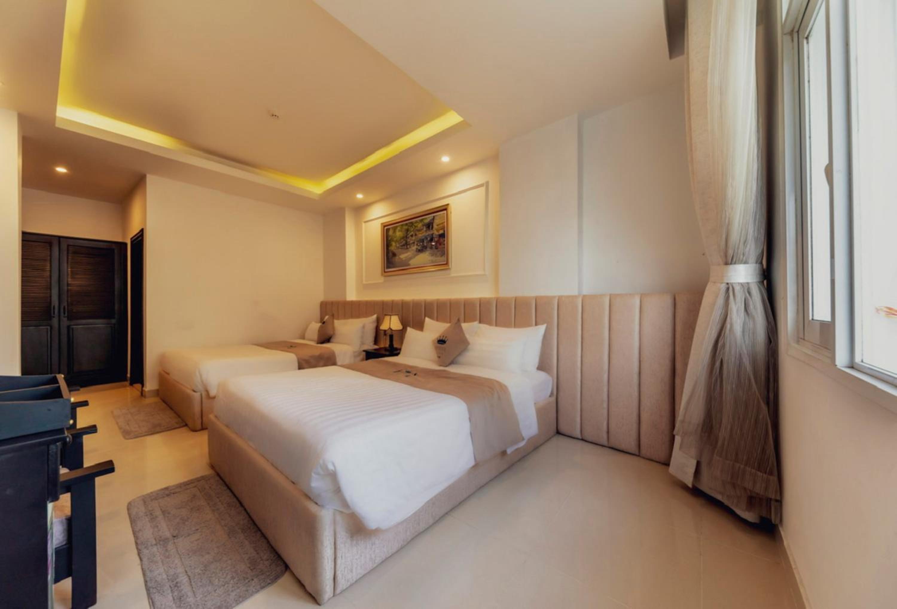 Deluxe Quadruple Room - Photo 11