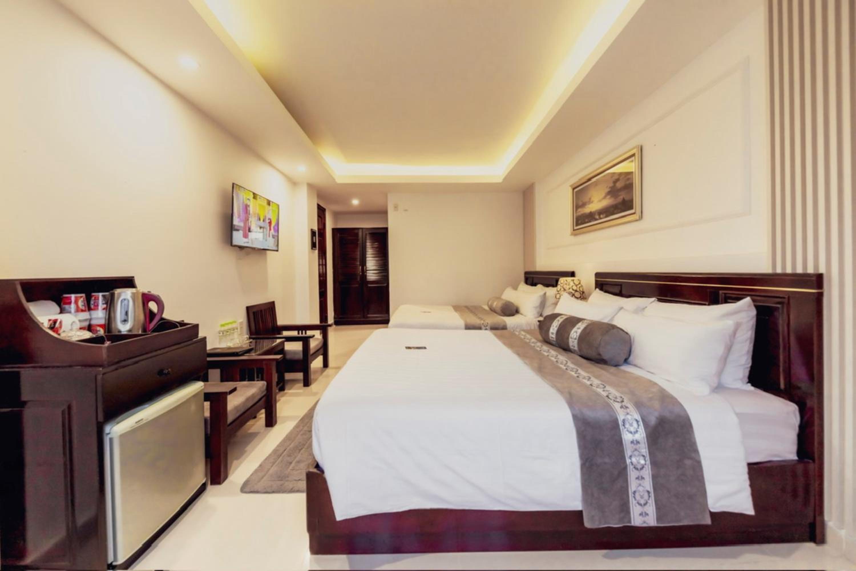 Deluxe Quadruple Room - Photo 10