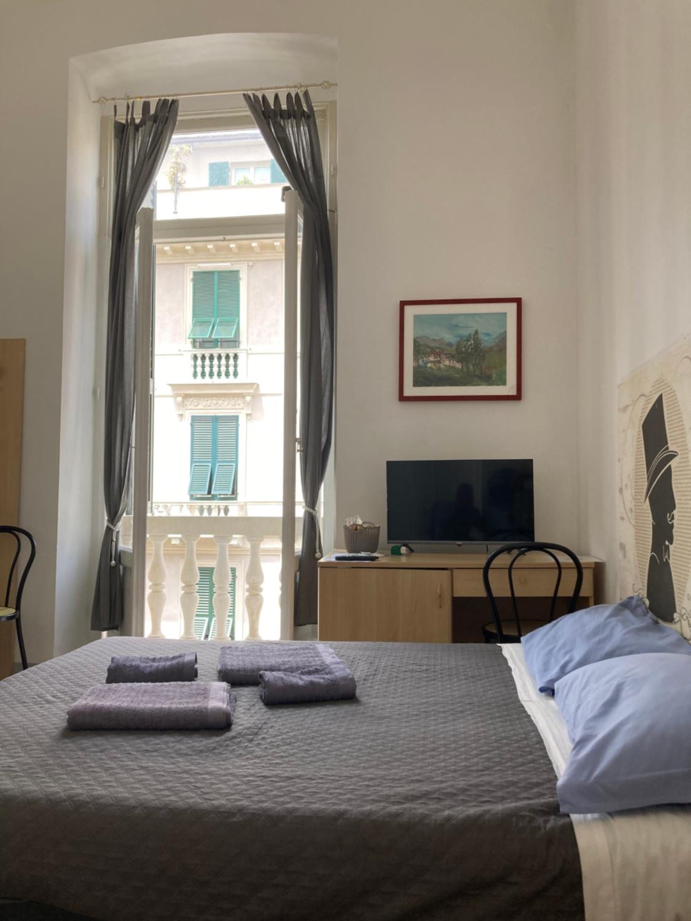 Premium Quadruple Room - Photo 11