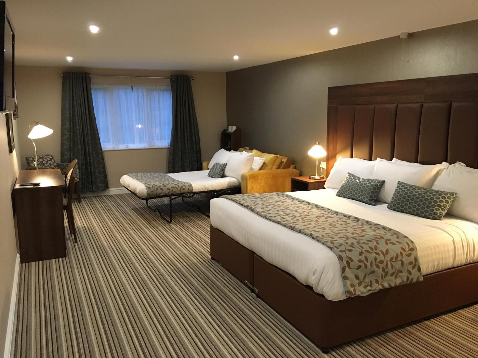 Deluxe Family Room (2 Adults + 2 Children) - Photo 1