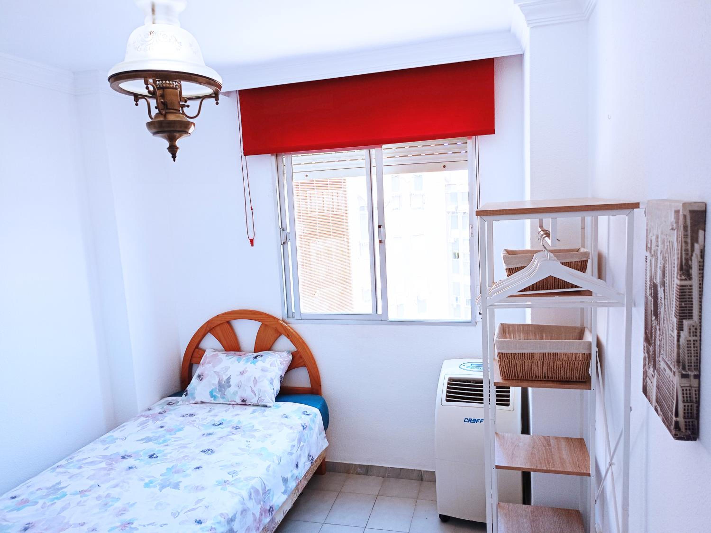Habitación individual con baño compartido