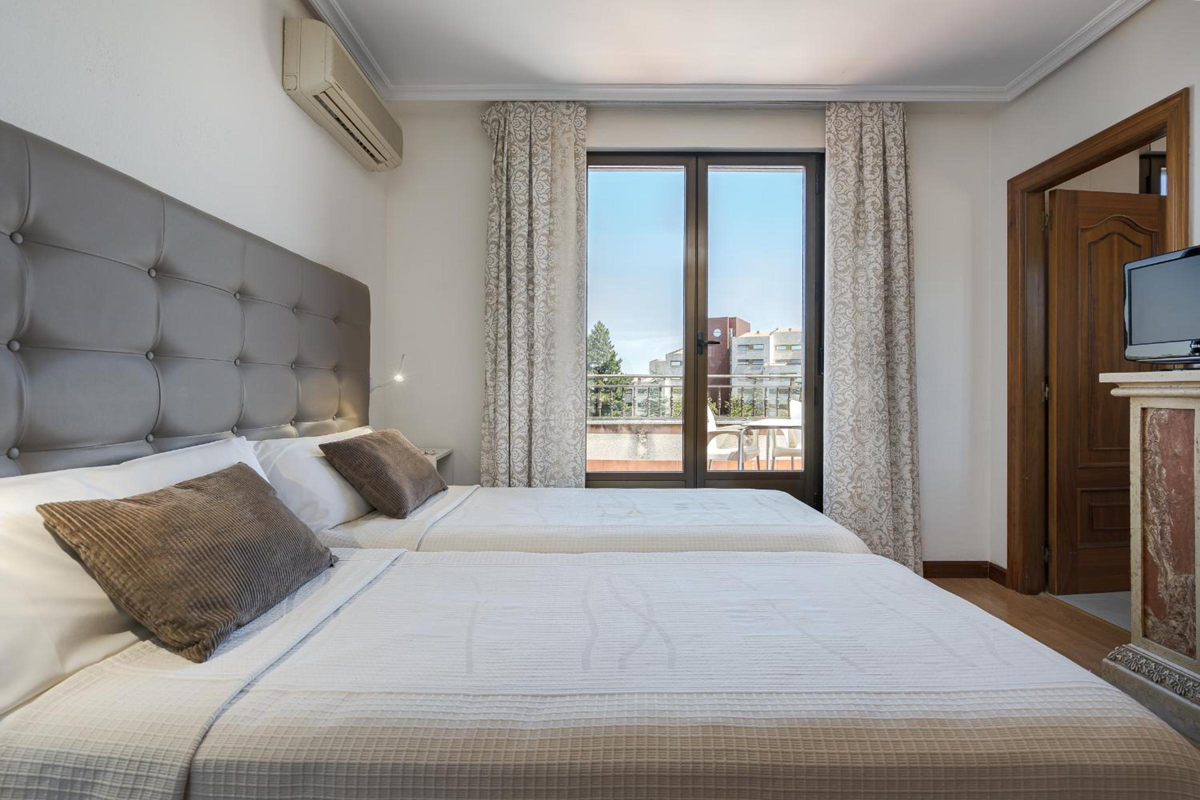Habitación triple con terraza