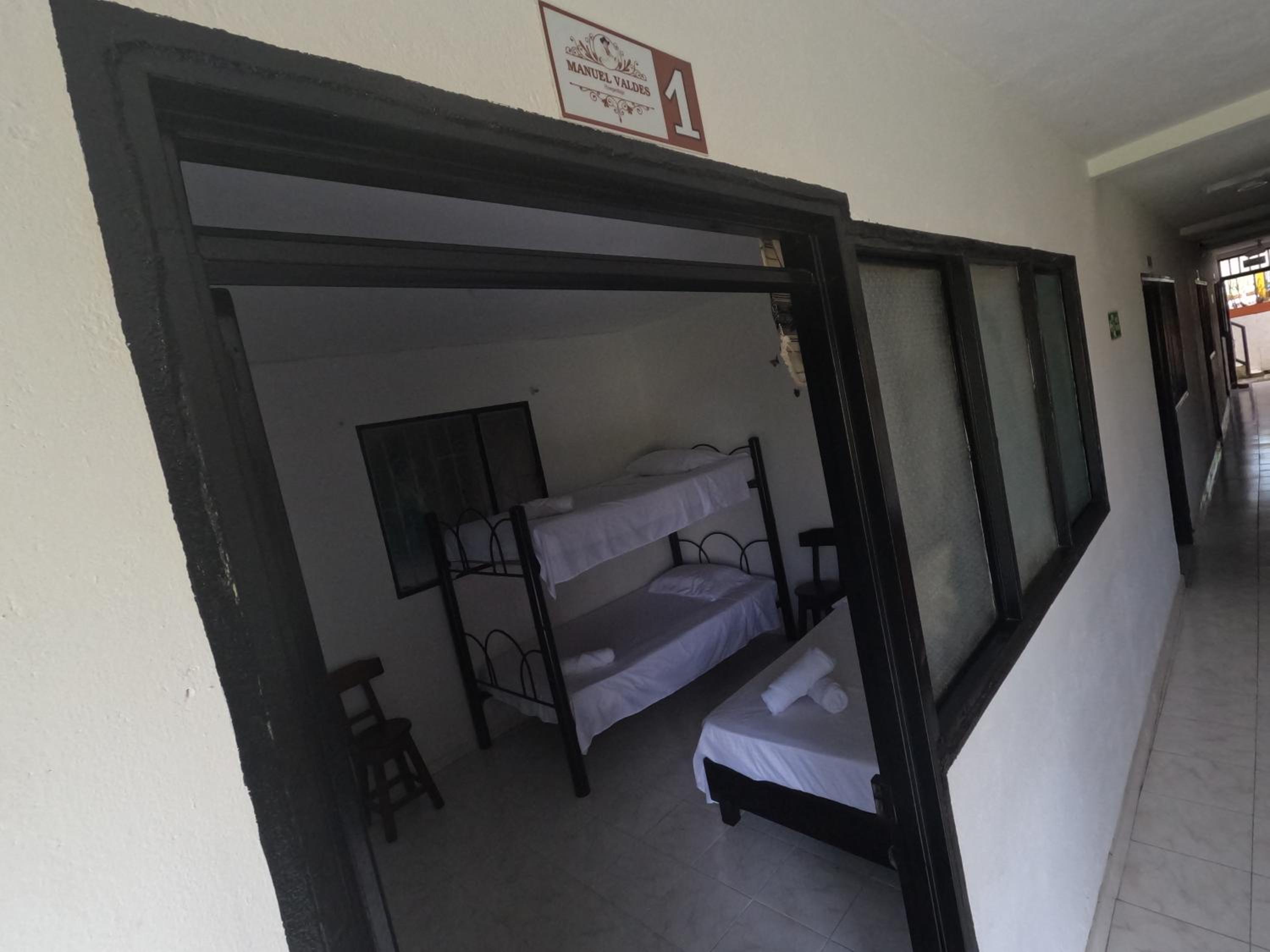 Quadruple Room with Private Bathroom photo 3