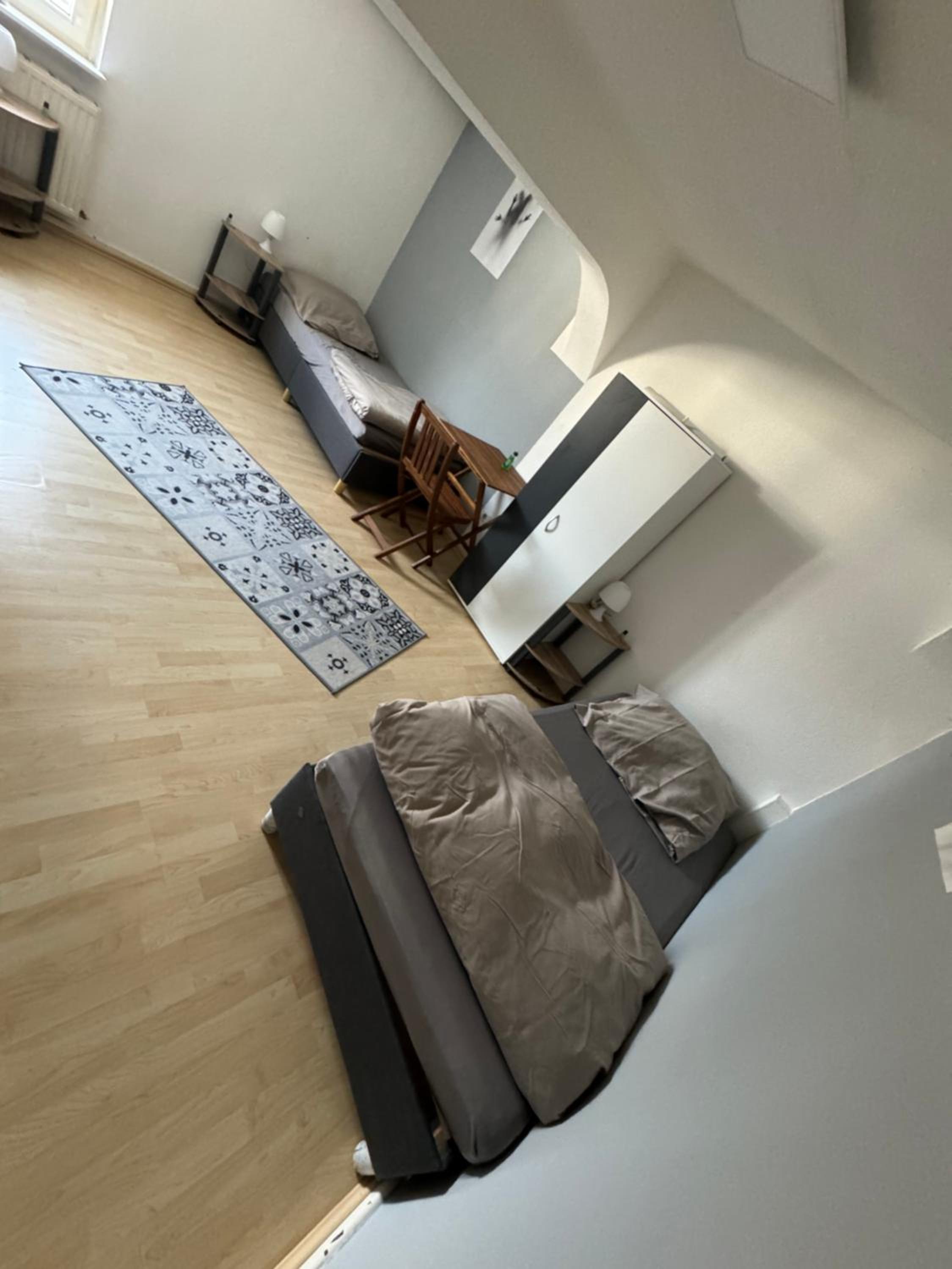 Basic Triple Room With Shared Bathroom photo 2