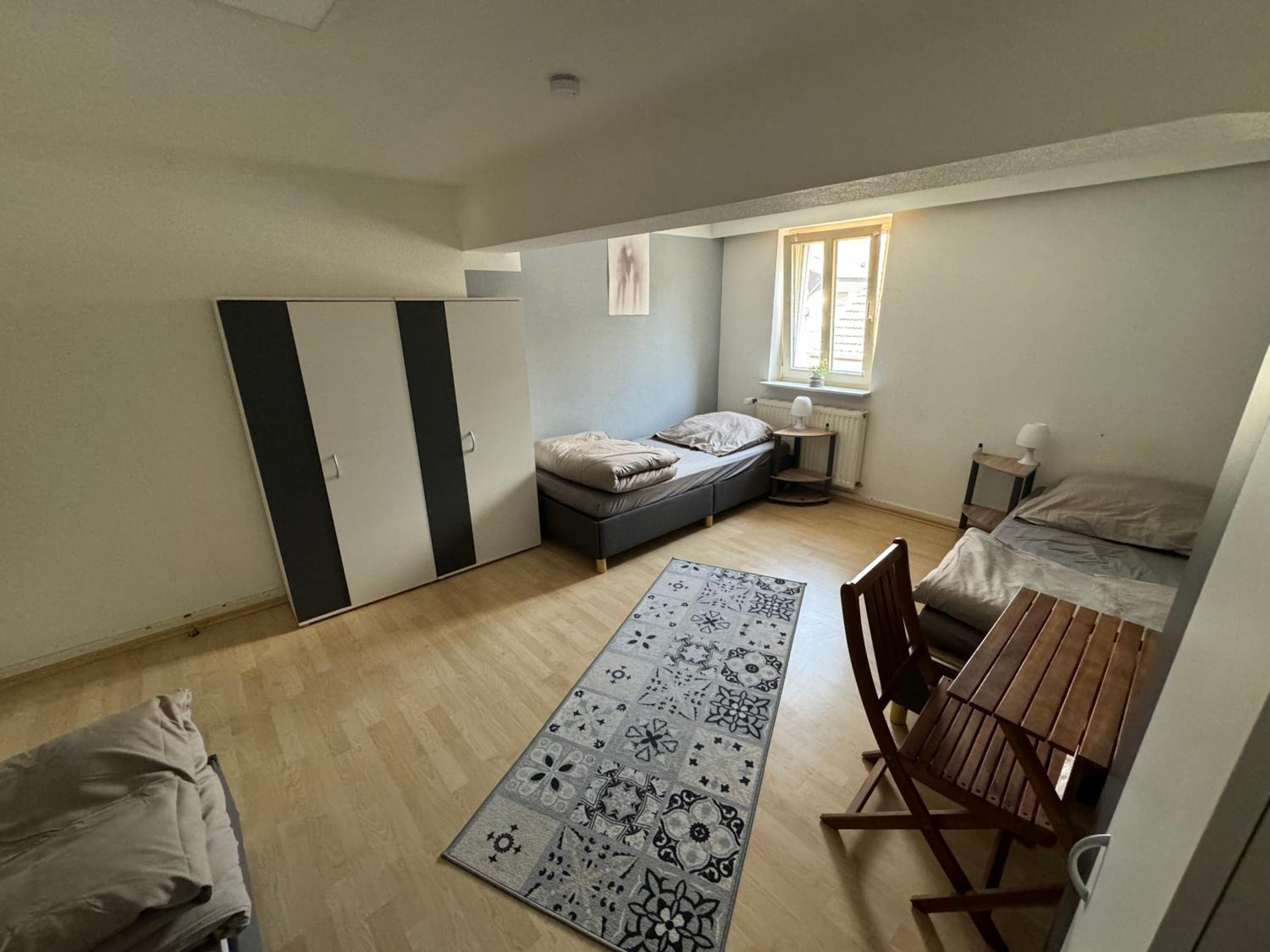 Basic Triple Room With Shared Bathroom photo 3