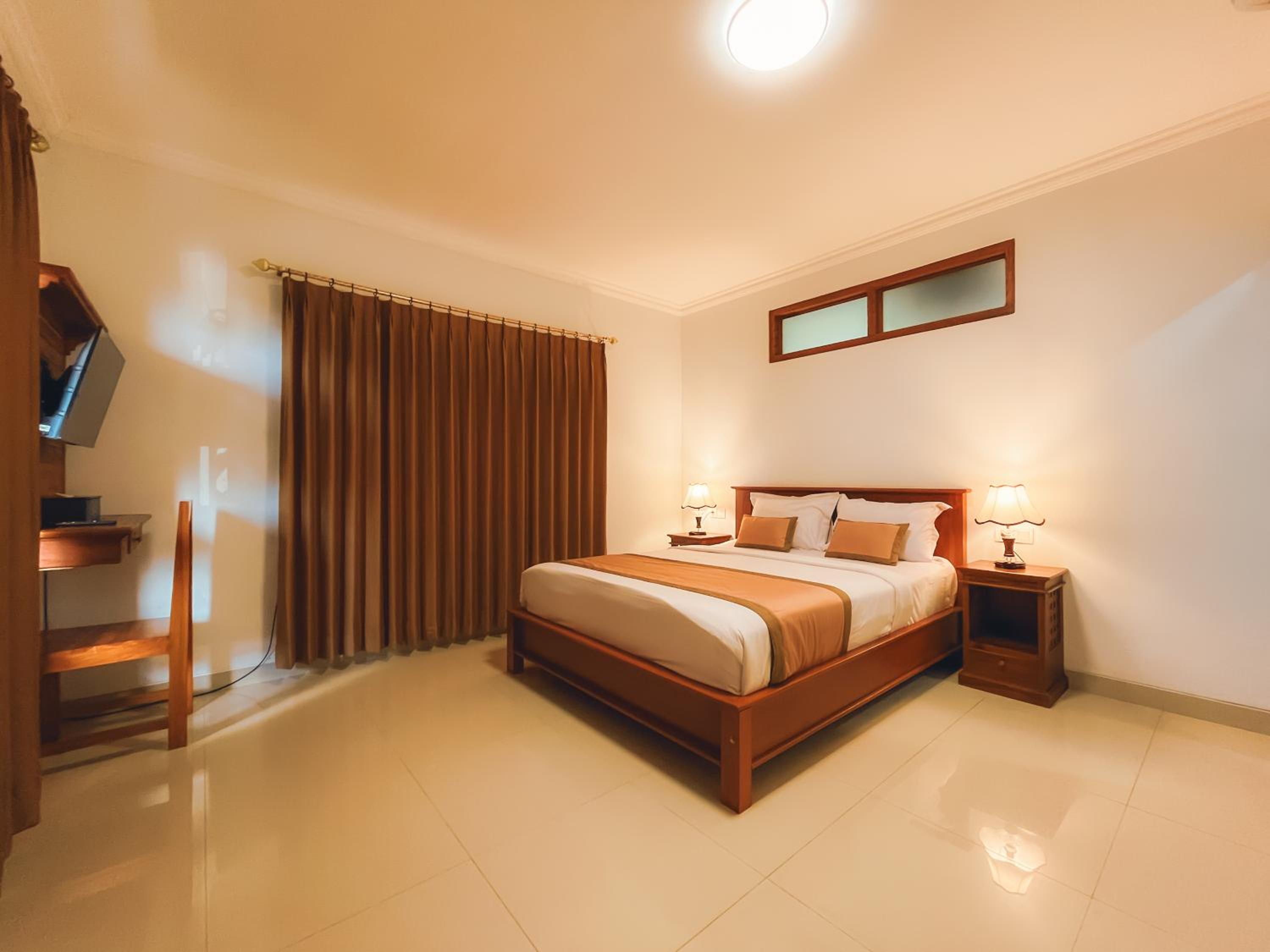Deluxe Room - Photo 35