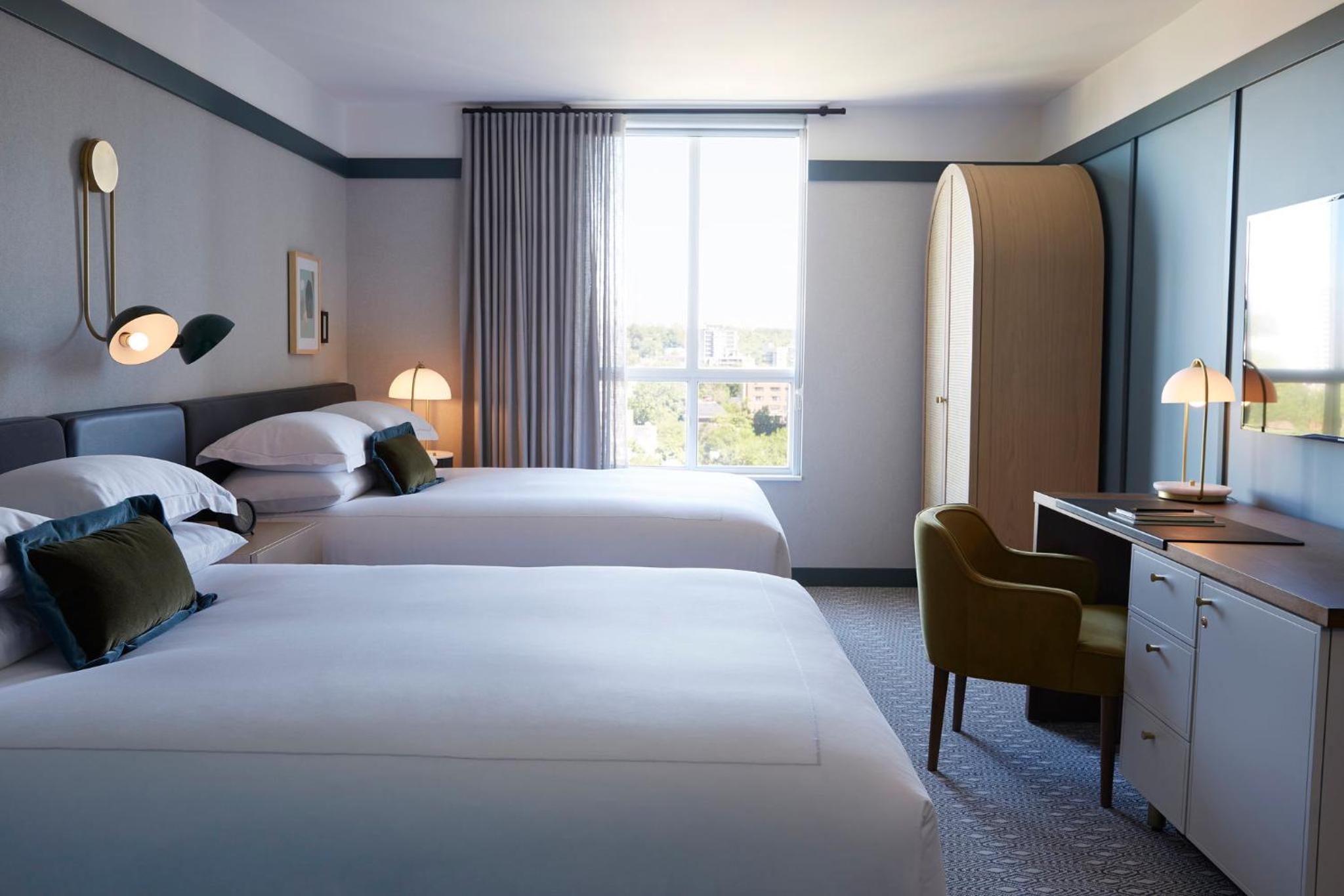Premium Queen Room with Two Queen Beds and Walk-In Shower - Photo 1