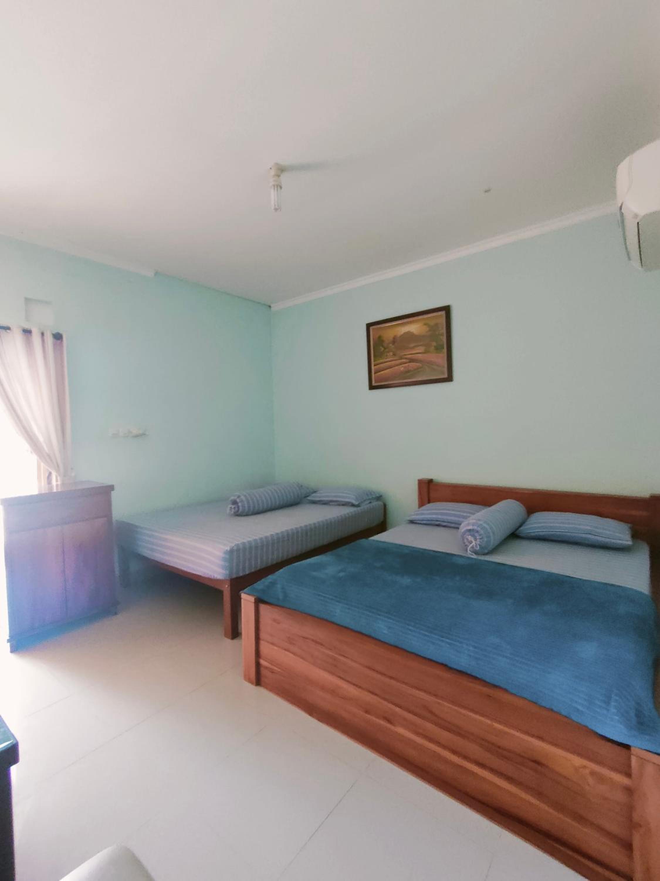 Deluxe Double Room (2 Adults + 1 Child) - Photo 1