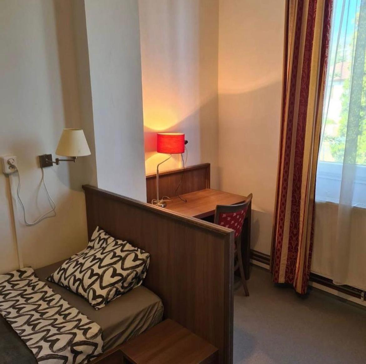Single Bed In Male Dormitory Room