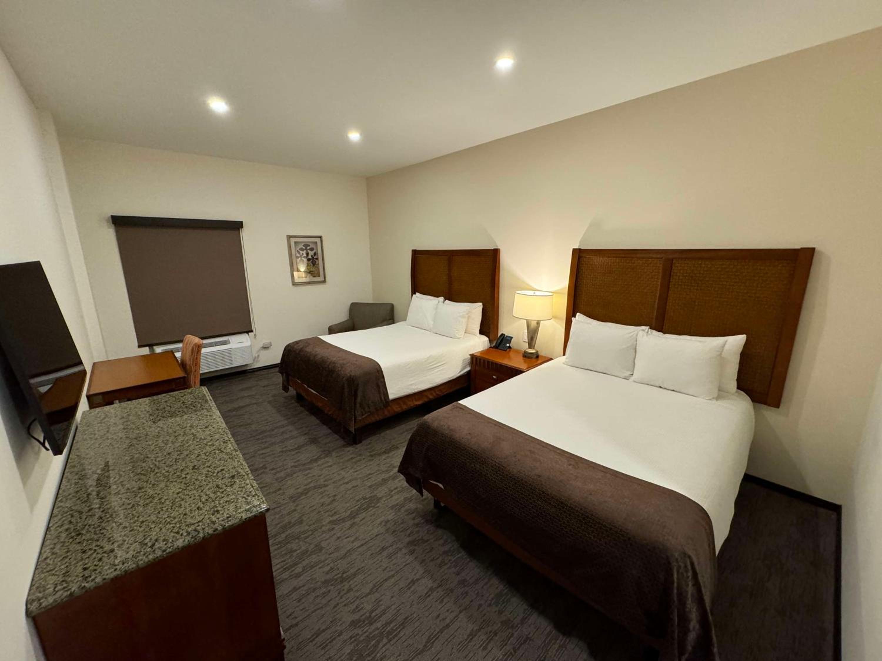 Queen Room with Two Queen Beds and Roll-In Shower - Mobility Accessible - Photo 1